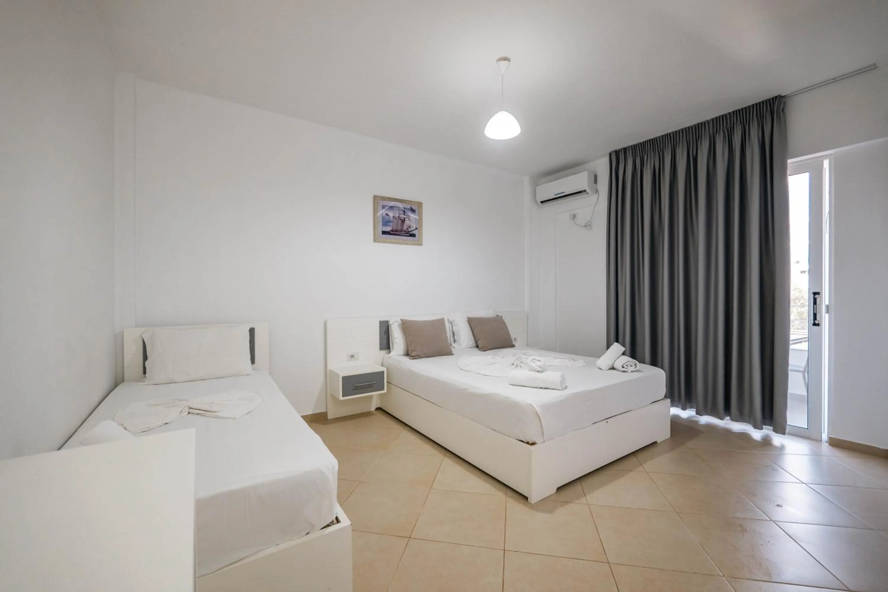 Bed in Sunshine Hotel