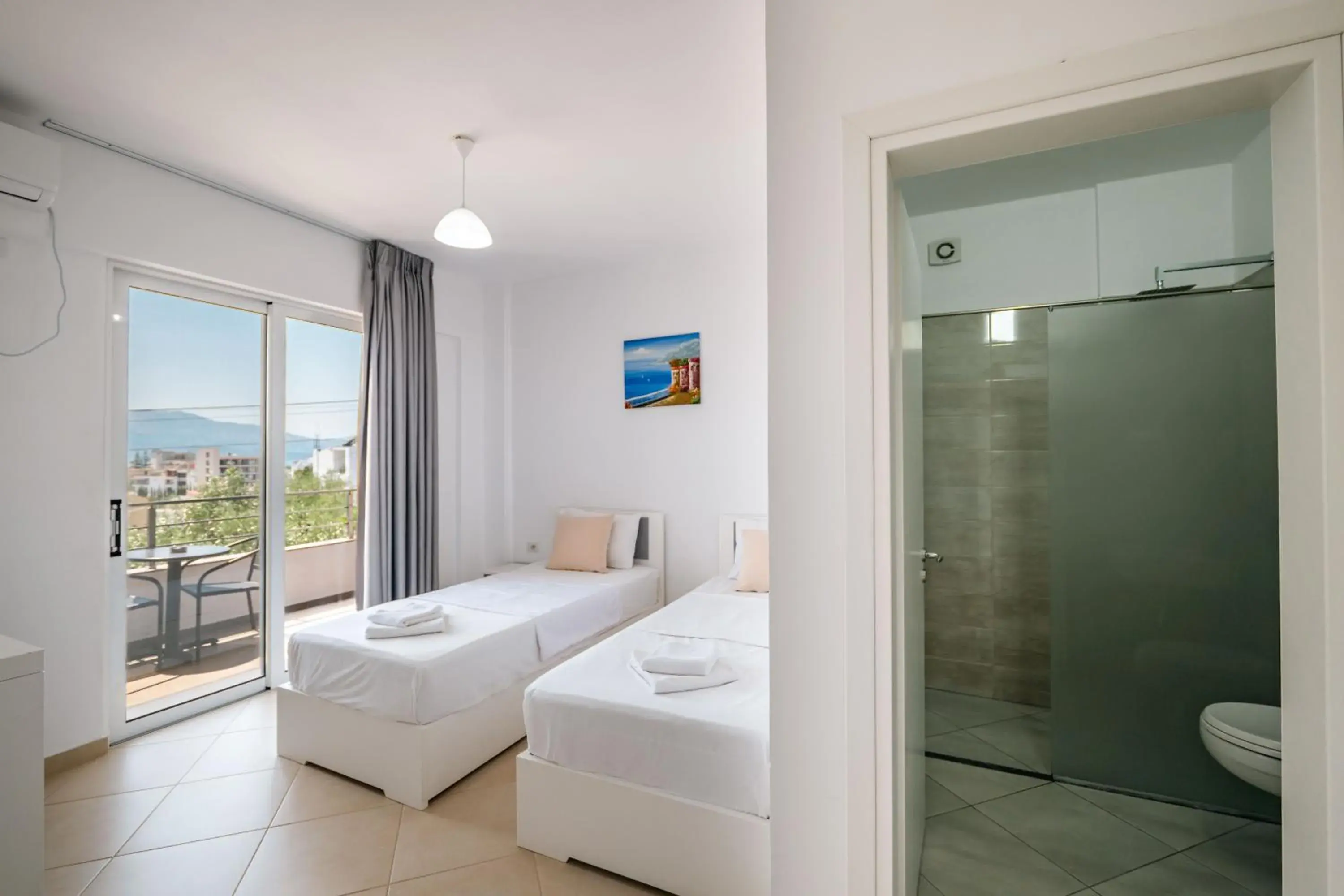 Twin Room with Balcony in Sunshine Hotel Twin Room with Balcony in Sunshine Hotel