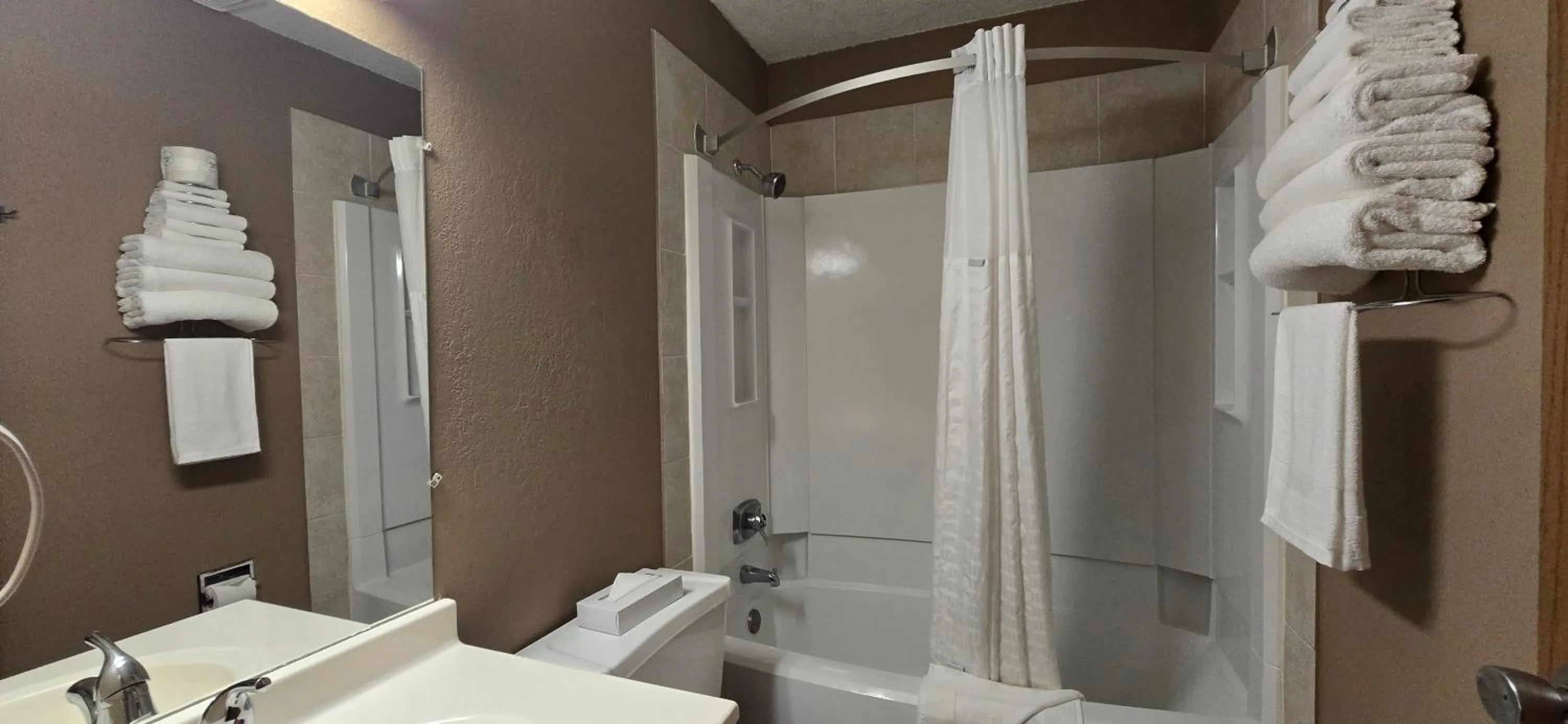Bathroom in Super 8 by Wyndham Rogers Minnesota