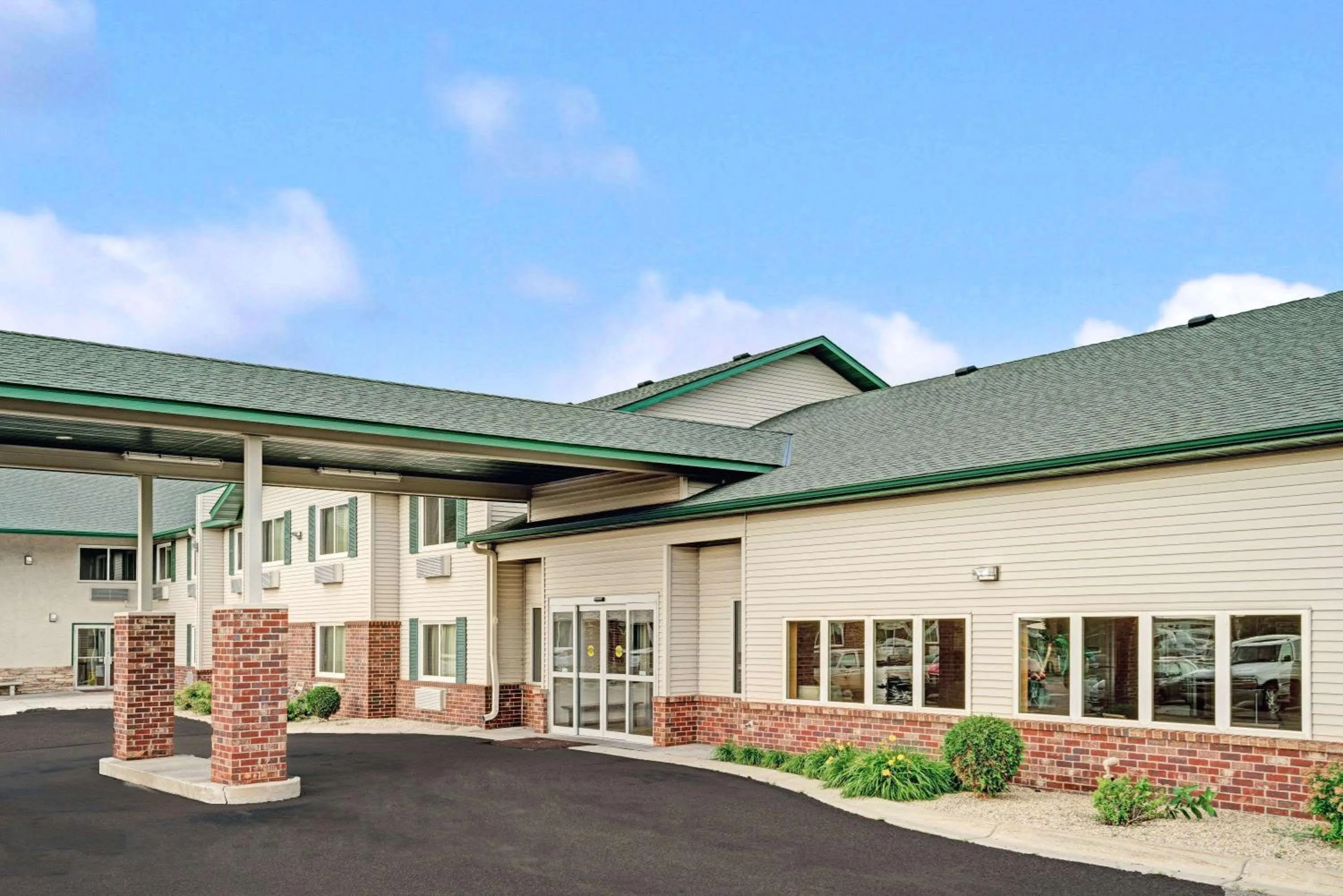 Property building in Super 8 by Wyndham Rogers Minnesota