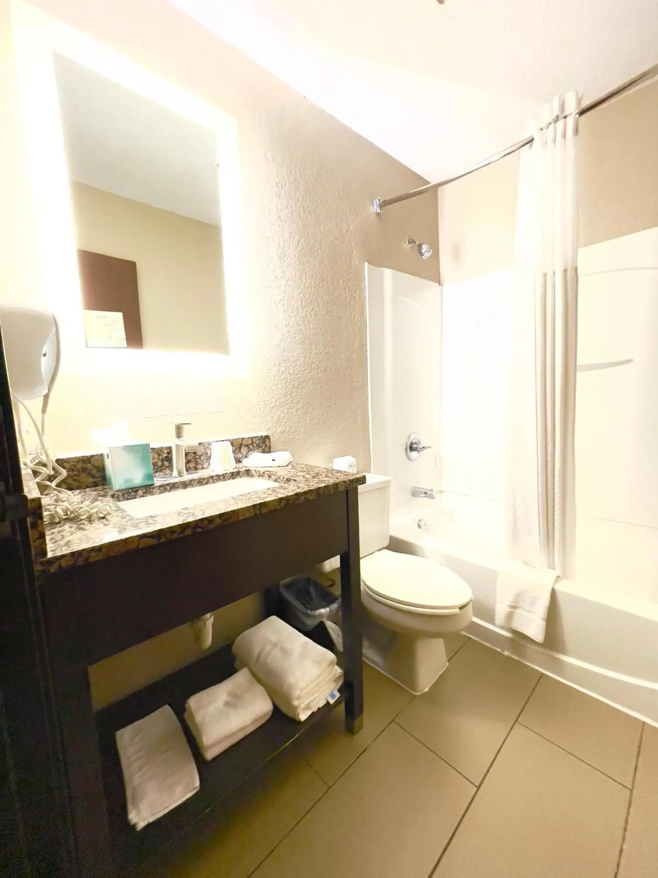 Bathroom in Super 8 by Wyndham Ithaca Bathroom in Super 8 by Wyndham Ithaca