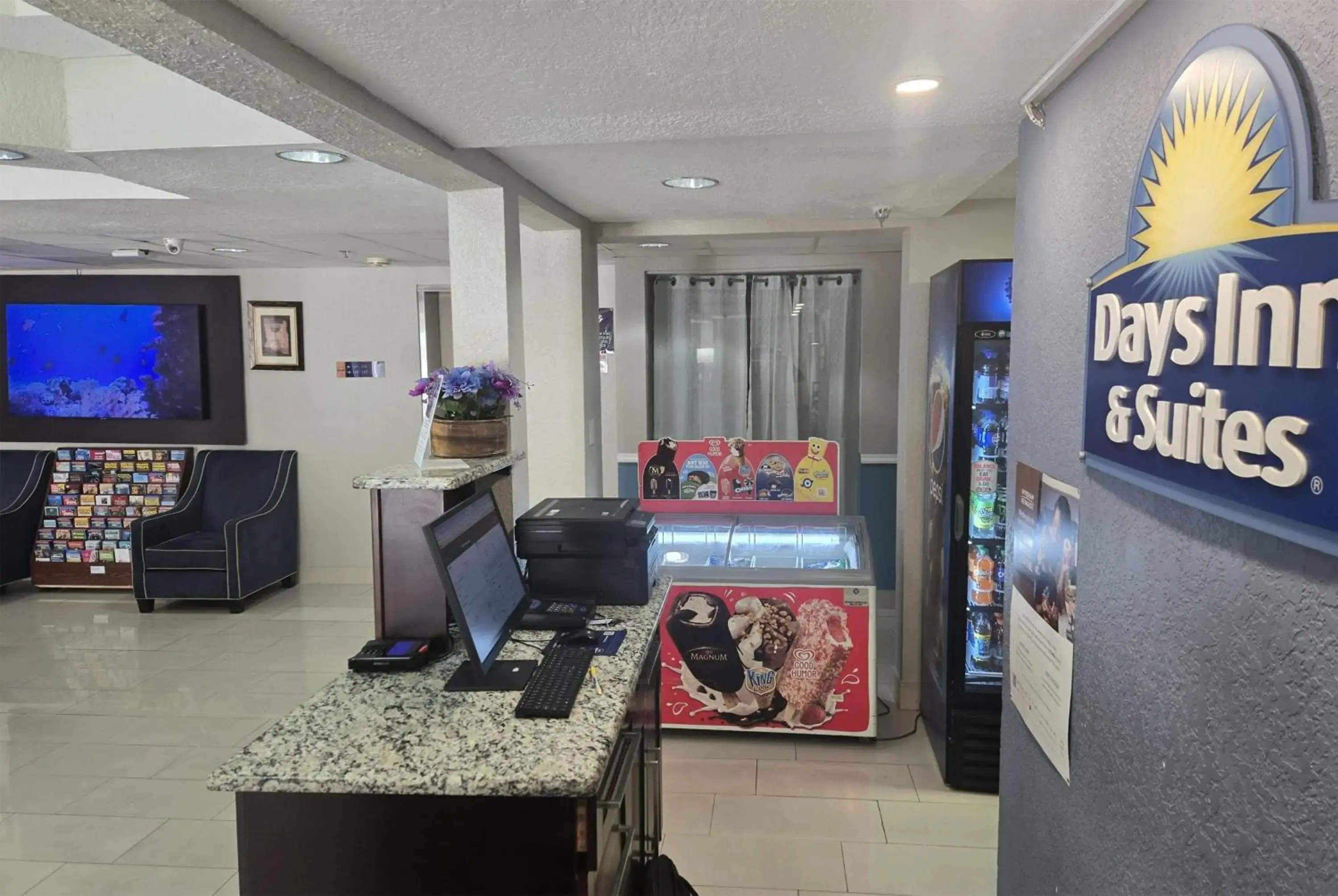 Lobby or reception in Days Inn & Suites by Wyndham Tampa/Raymond James Stadium Lobby or reception in Days Inn & Suites by Wyndham Tampa/Raymond James Stadium