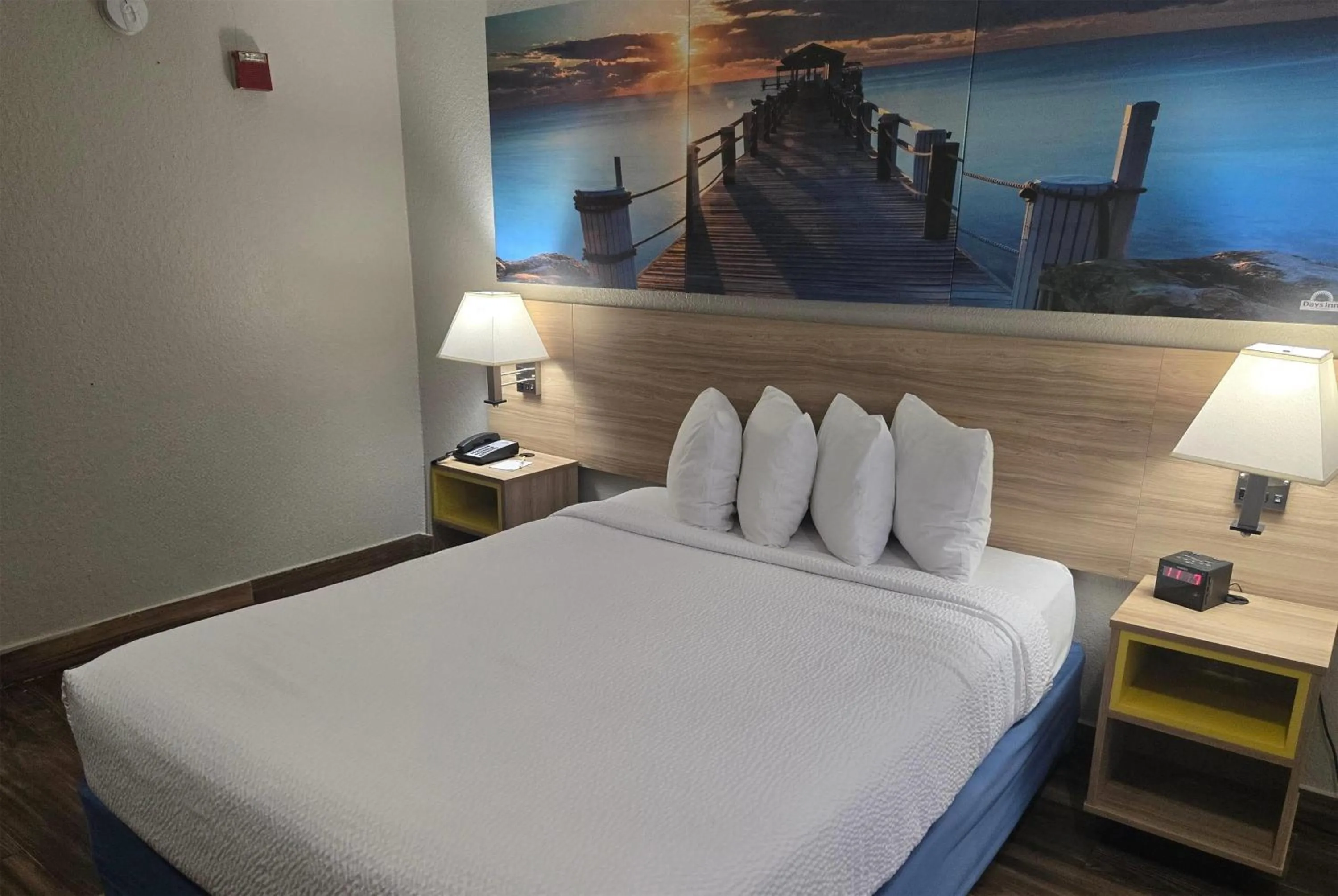 Photo of the whole room, Bed in Days Inn & Suites by Wyndham Tampa/Raymond James Stadium