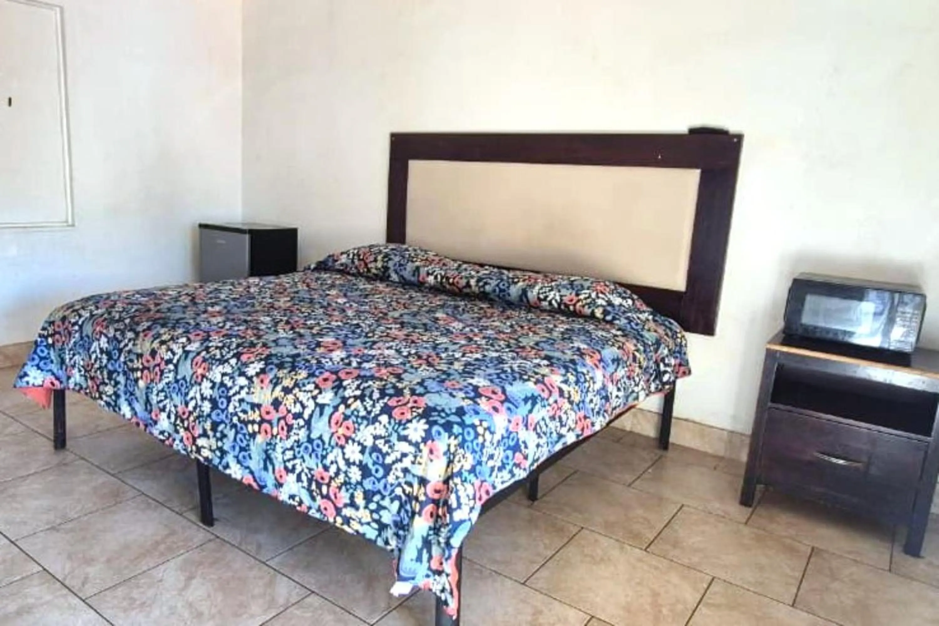 Bed in Antigua Motel by OYO Tampa US - 41