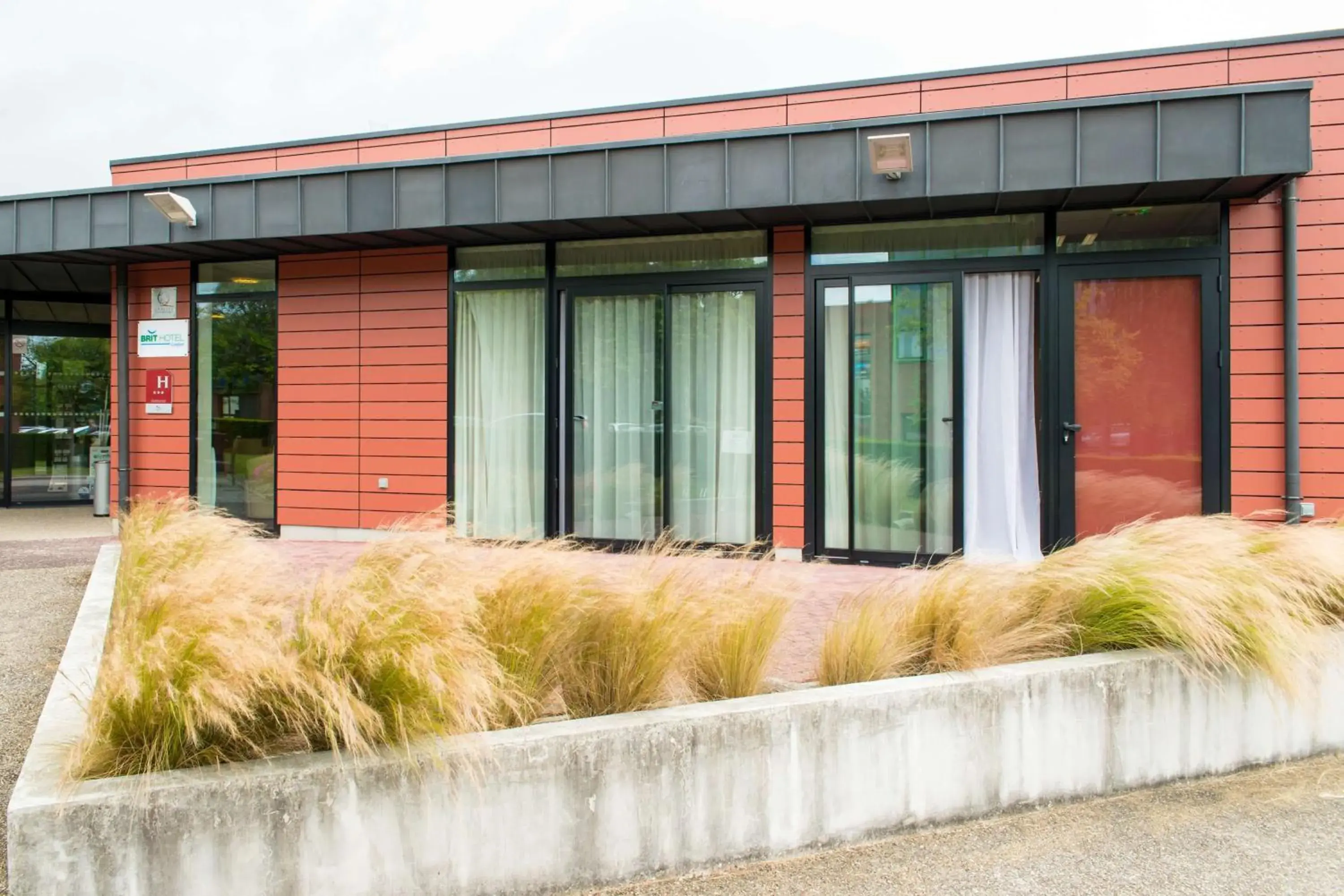 Property building in Brit Hotel Rennes St Grégoire – Le Villeneuve Property building in Brit Hotel Rennes St Grégoire – Le Villeneuve