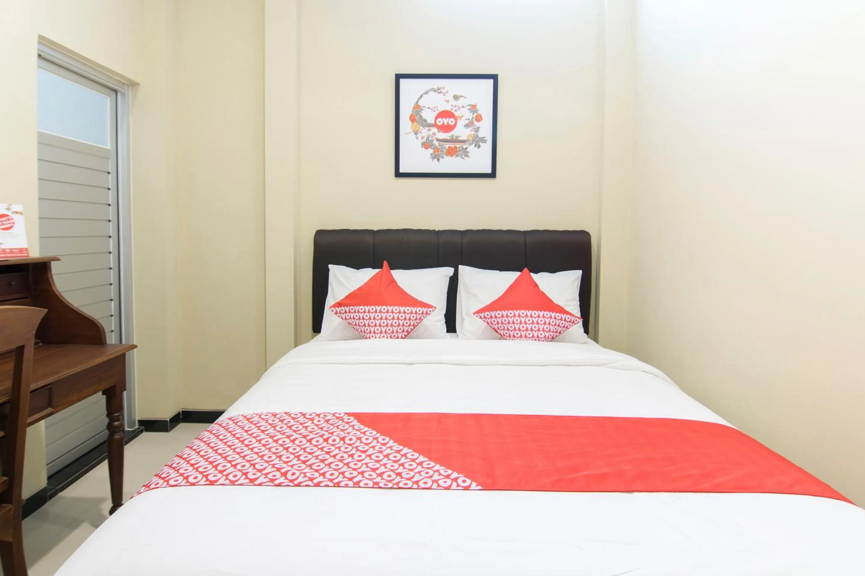 Bedroom in SUPER OYO 890 Dewi Fortuna Guest House