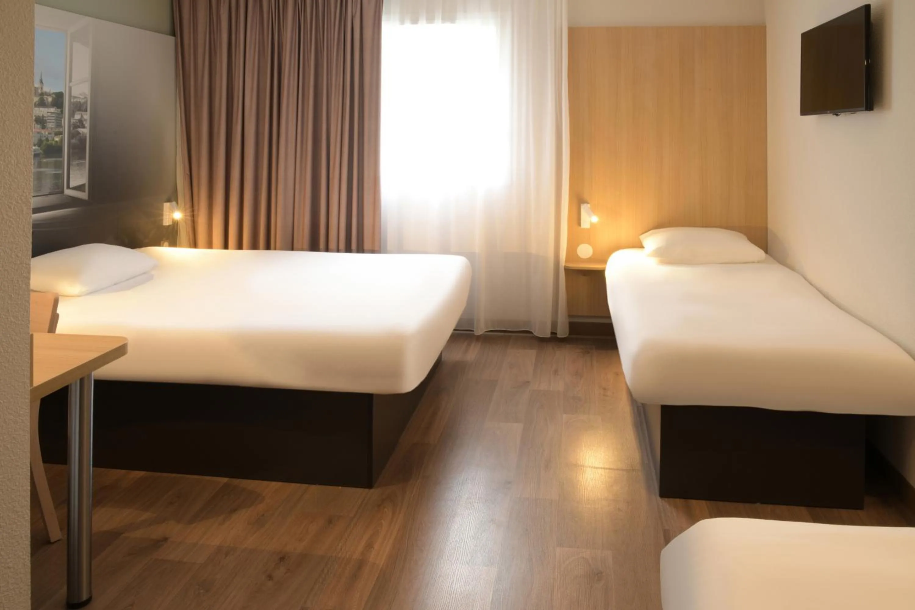 Photo of the whole room, Bed in B&B HOTEL Angoulême