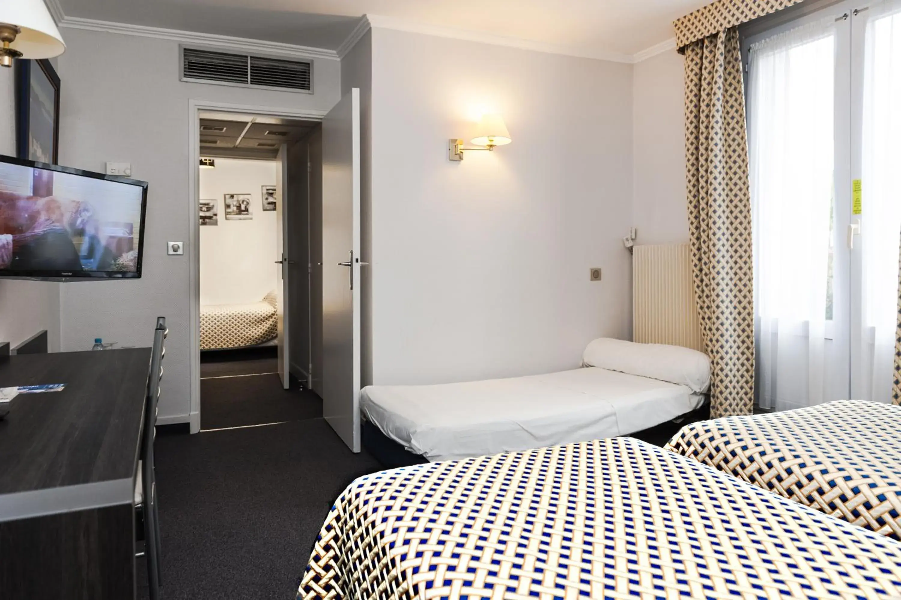 Photo of the whole room in Brit Hotel Cahors - Le France Photo of the whole room in Brit Hotel Cahors - Le France