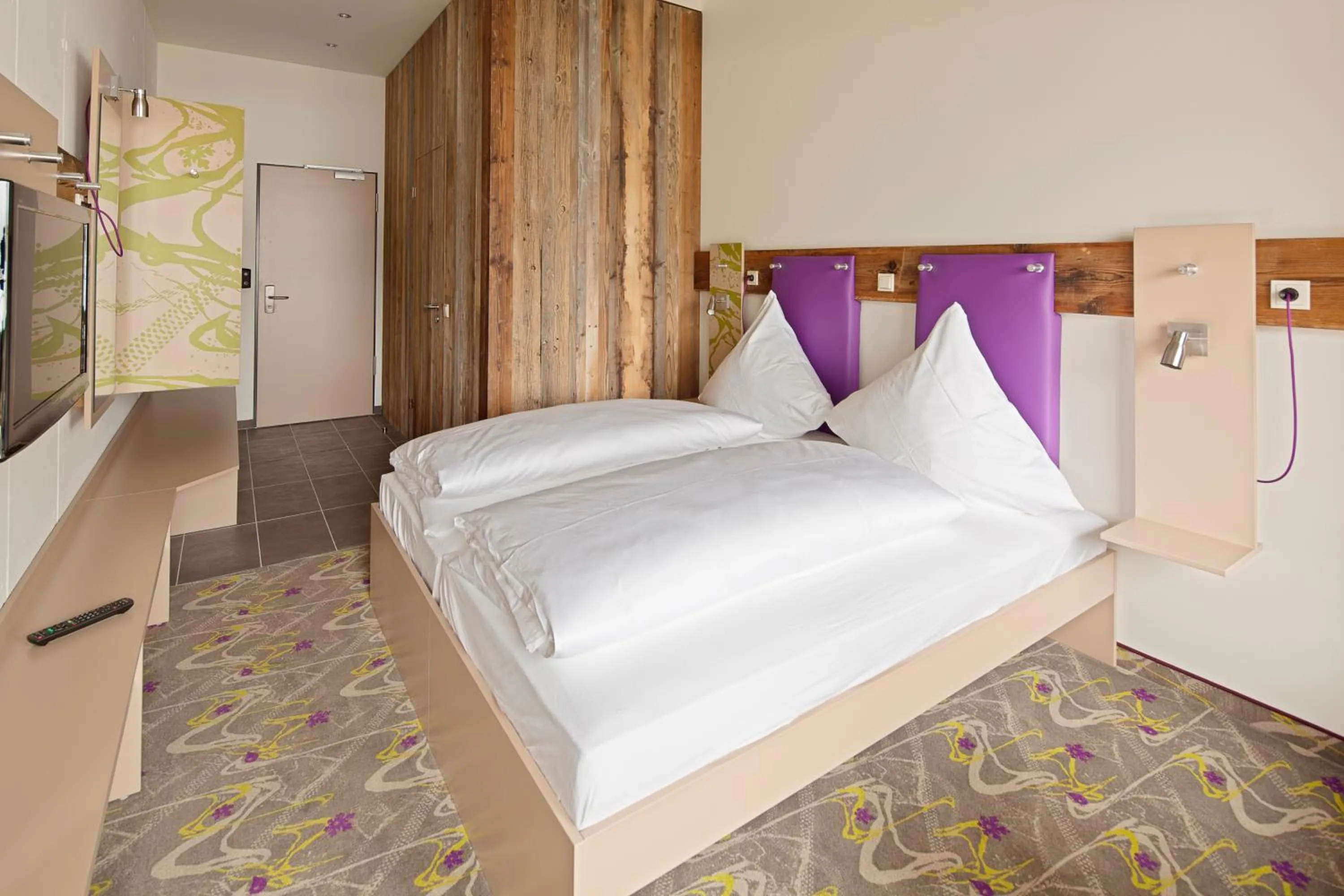 Photo of the whole room, Bed in Explorer Hotel Bad Kleinkirchheim