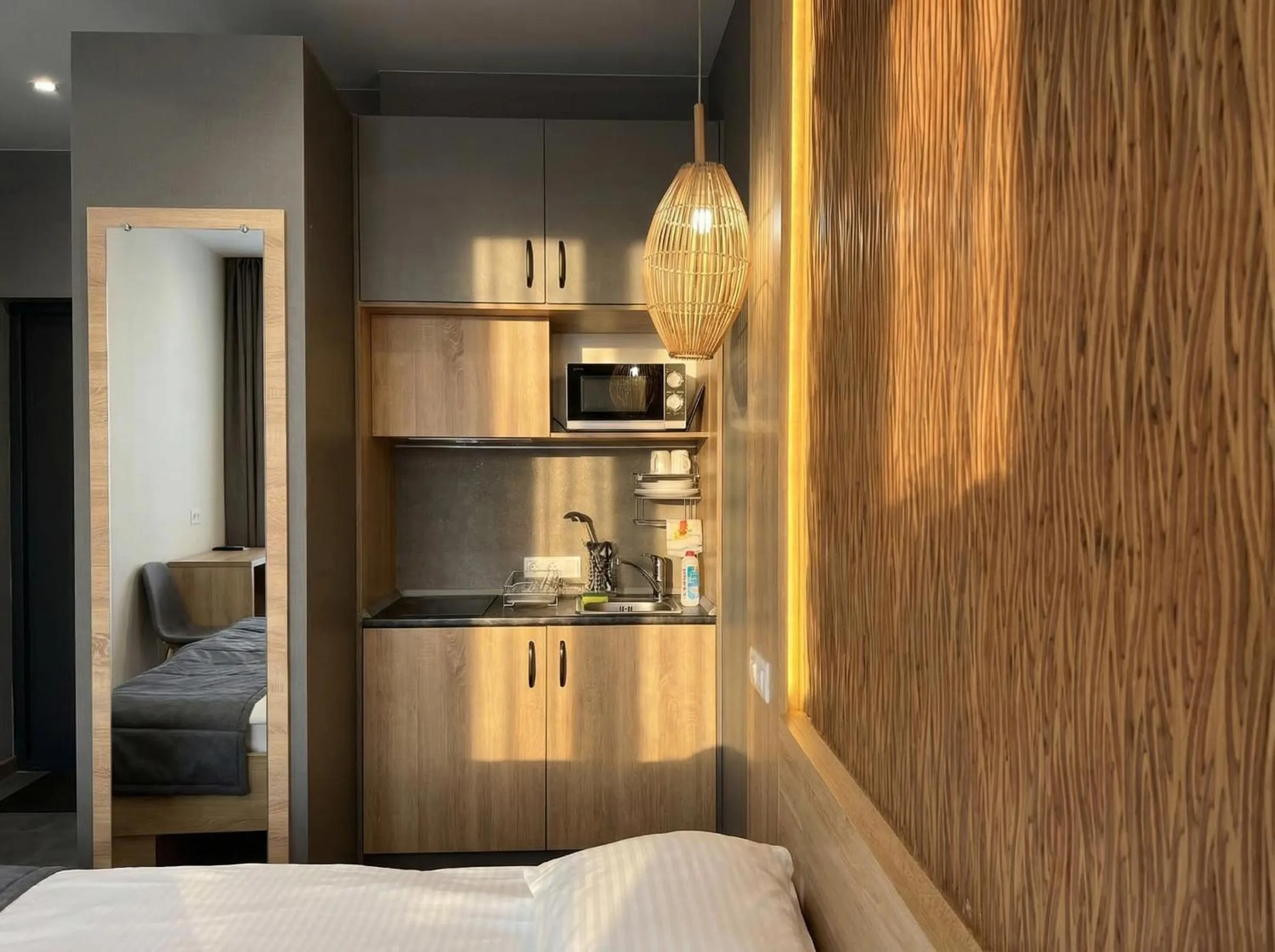 Kitchen or kitchenette, Bed in Mykonos Hotel Apart - Maestro