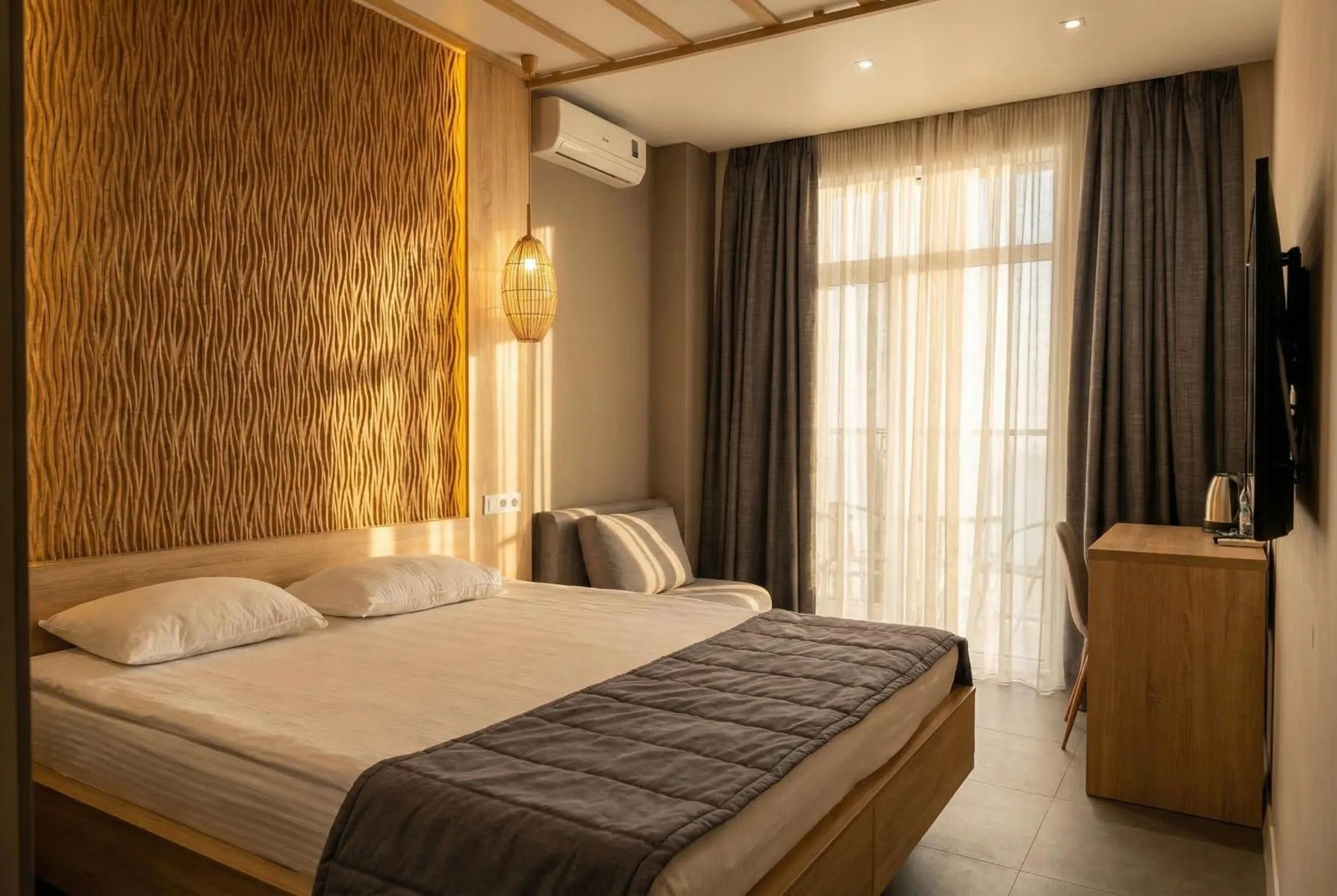 Communal lounge/ TV room, Bed in Mykonos Hotel Apart - Maestro