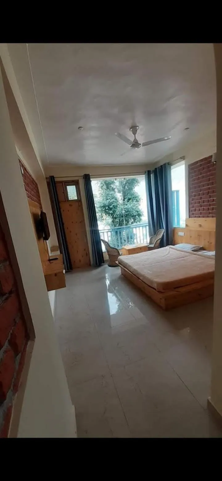 Bed in White Water Inn Mcleodganj