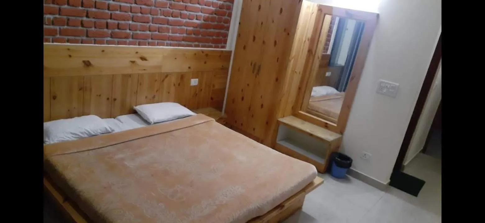 Bed in White Water Inn Mcleodganj