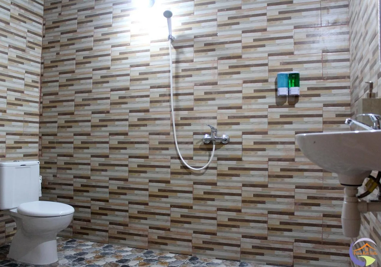 Toilet in Putra Bali Villa by Bukit Vista