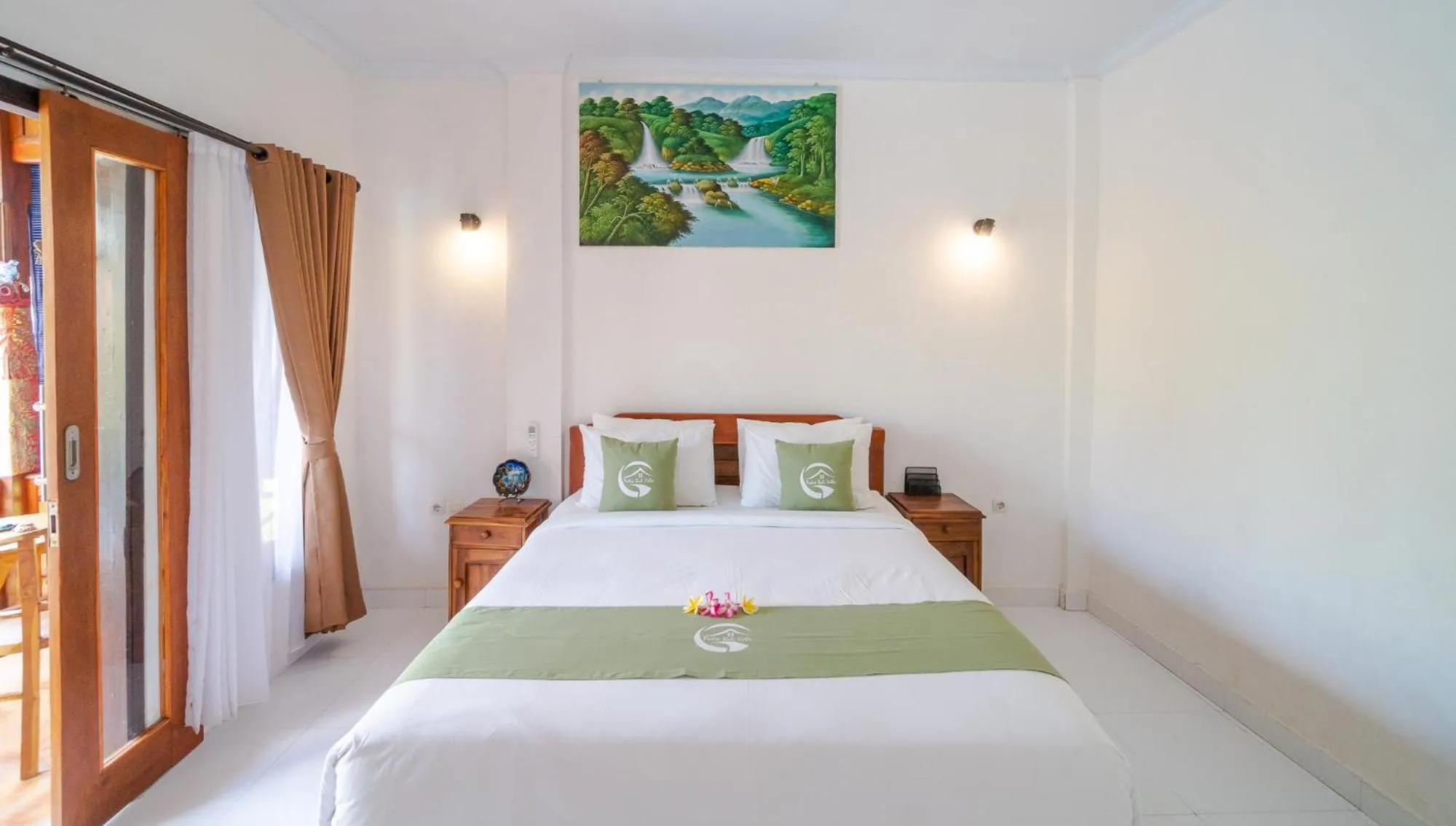 Bed in Putra Bali Villa by Bukit Vista