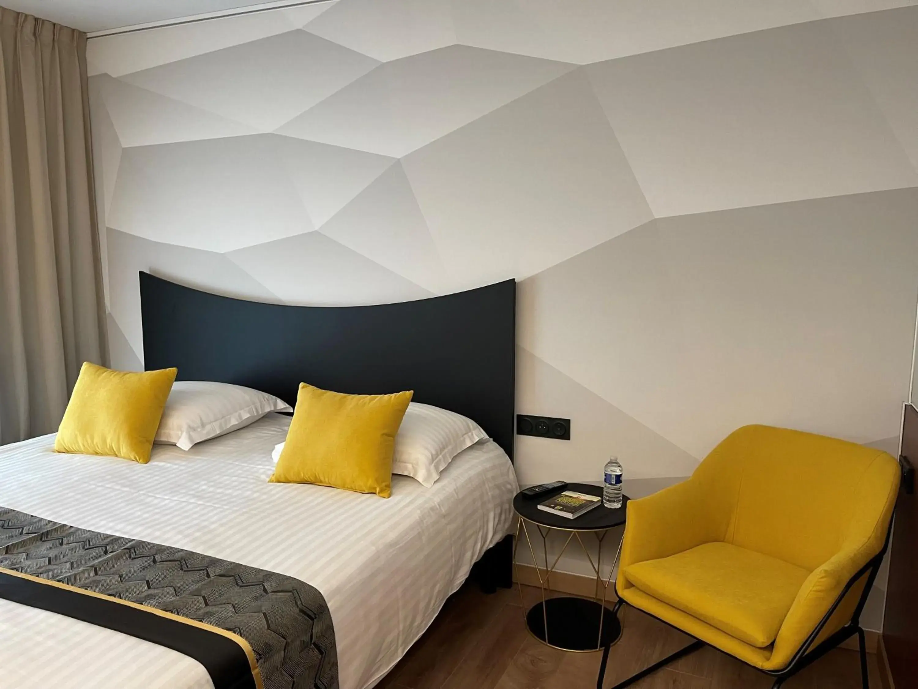 Bed in Logis Hotel Center Bed in Logis Hotel Center