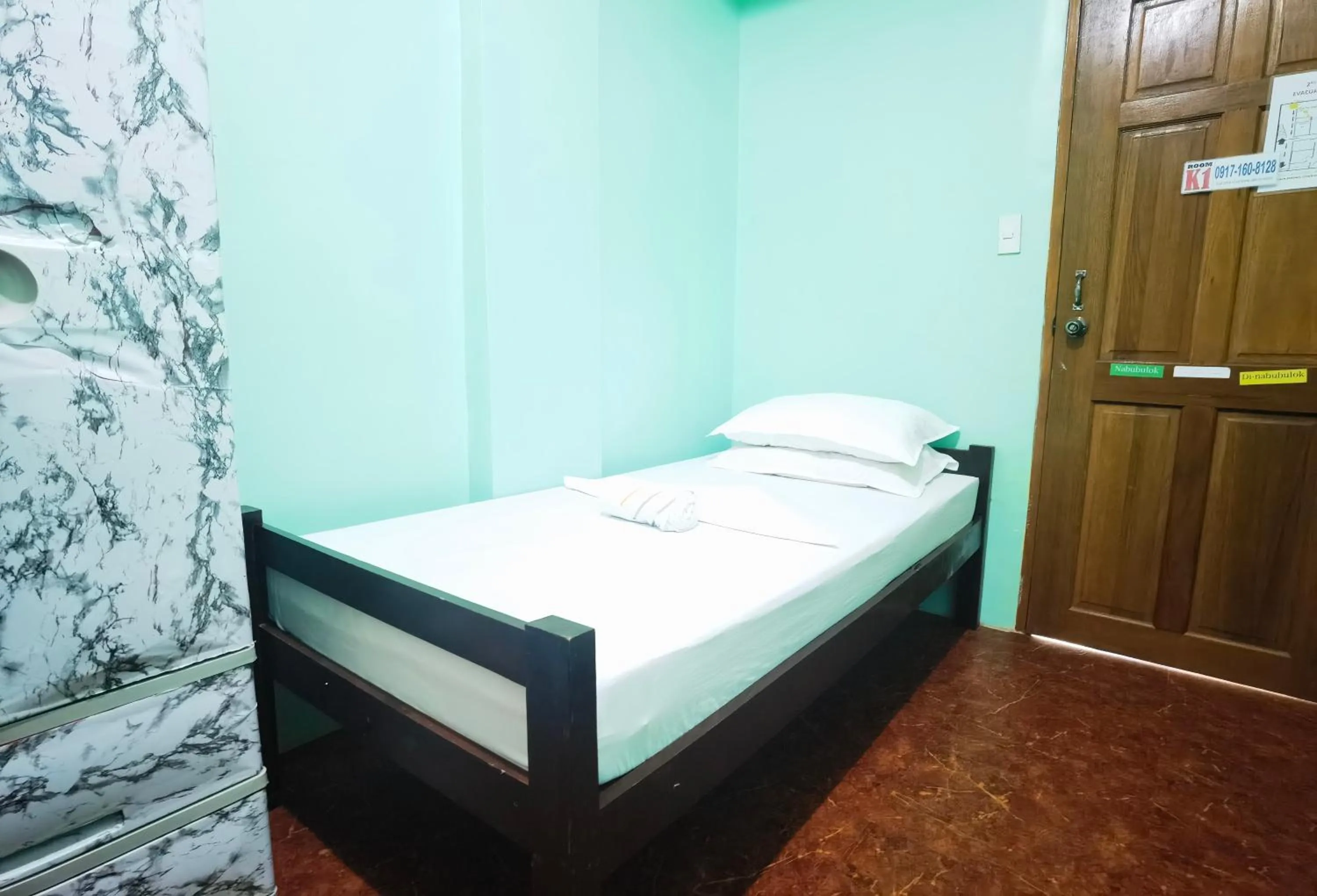 Bed in RedDoorz at D128 Lodge Cagayan Valley