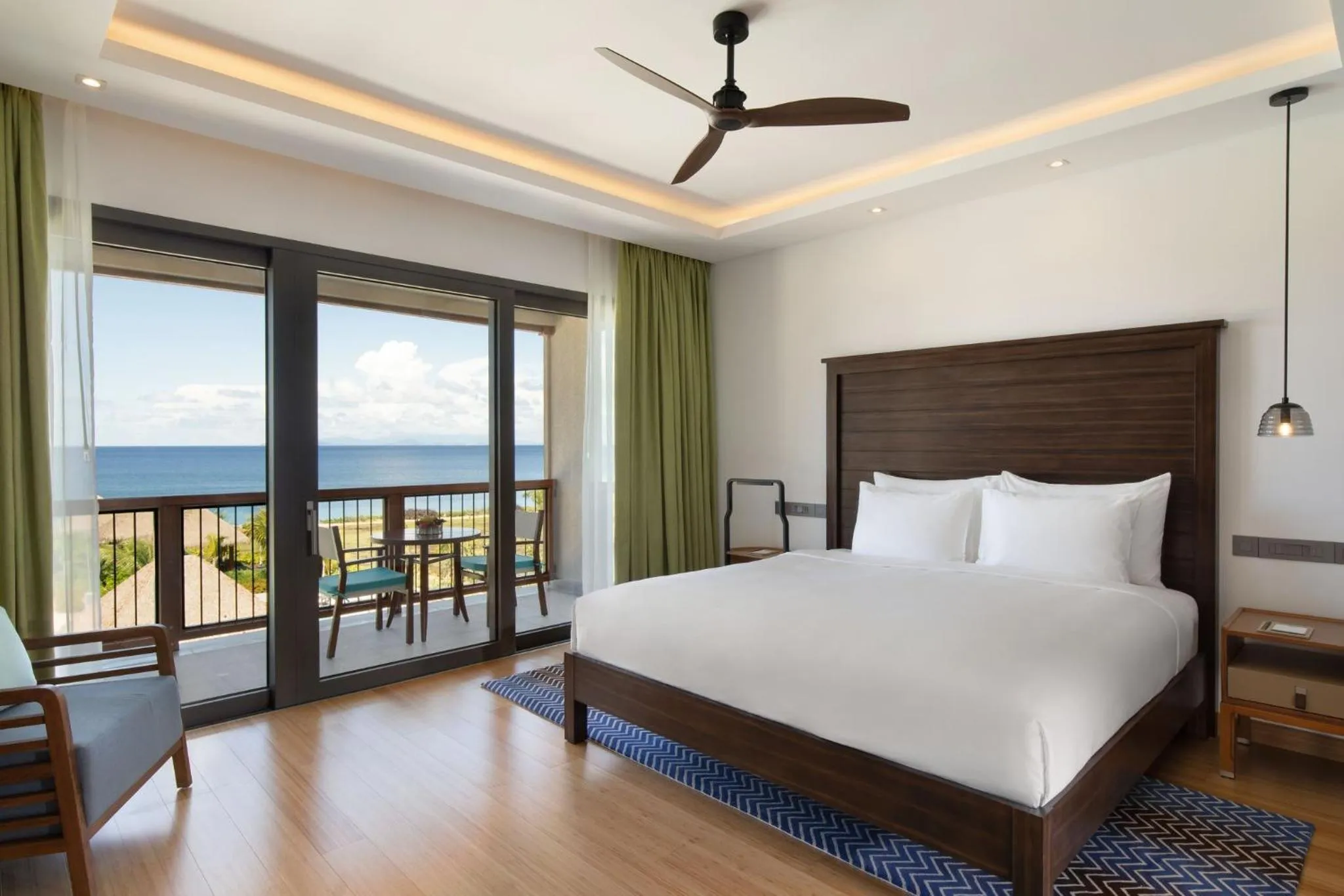 Photo of the whole room, Bed in InterContinental Dominica Cabrits Resort & Spa by IHG