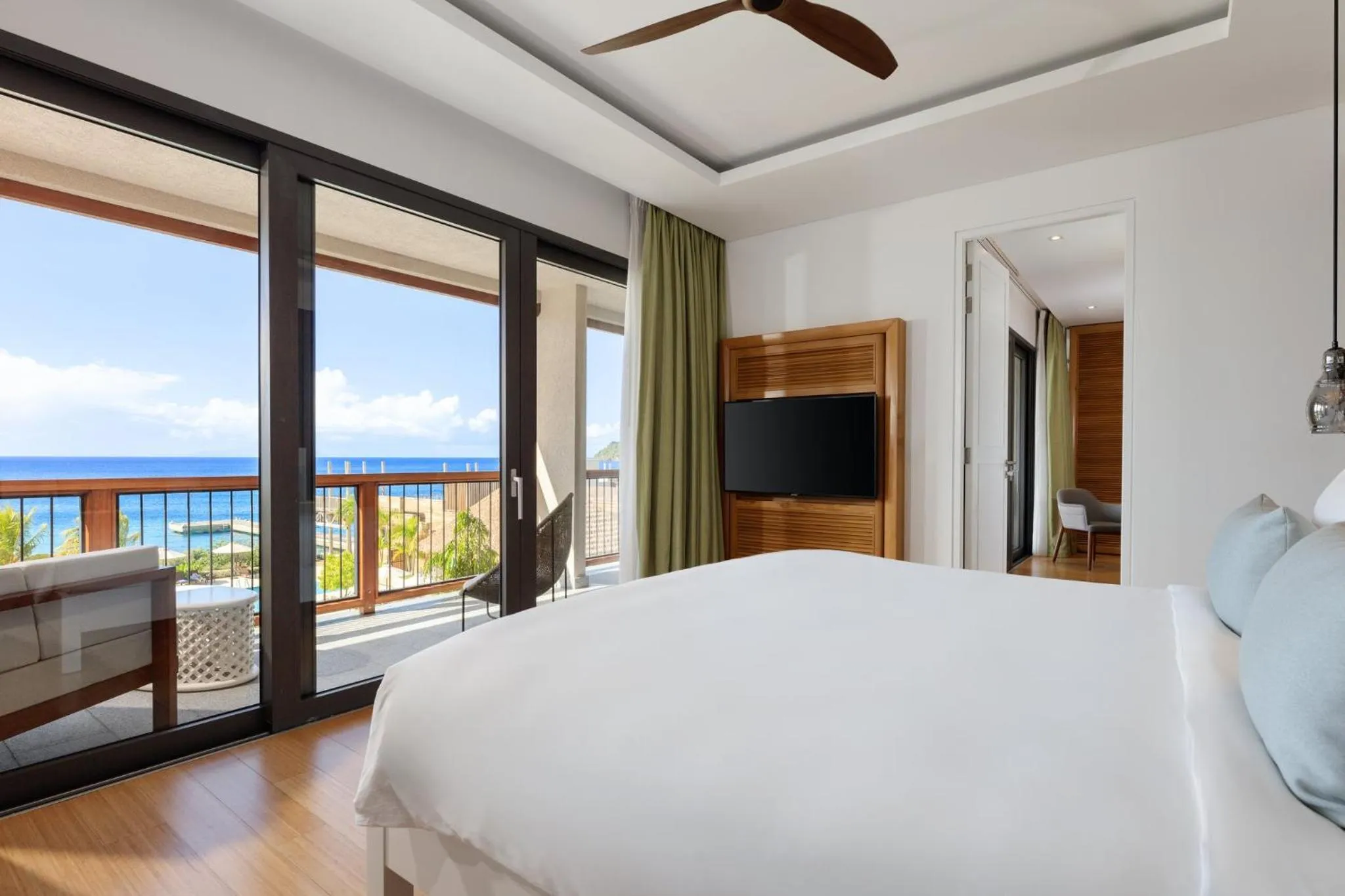 Photo of the whole room, Bed in InterContinental Dominica Cabrits Resort & Spa by IHG