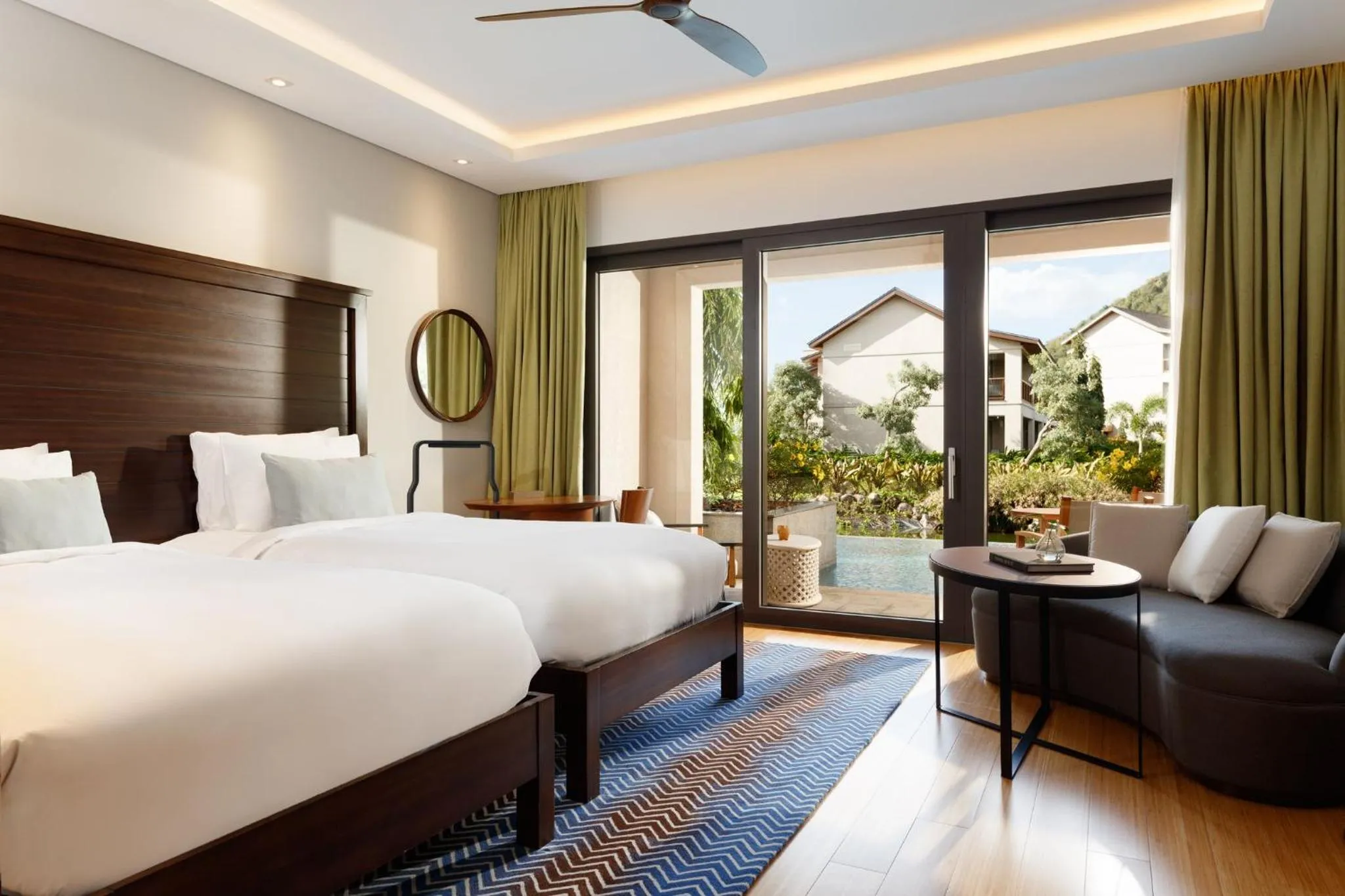 Photo of the whole room, Bed in InterContinental Dominica Cabrits Resort & Spa by IHG