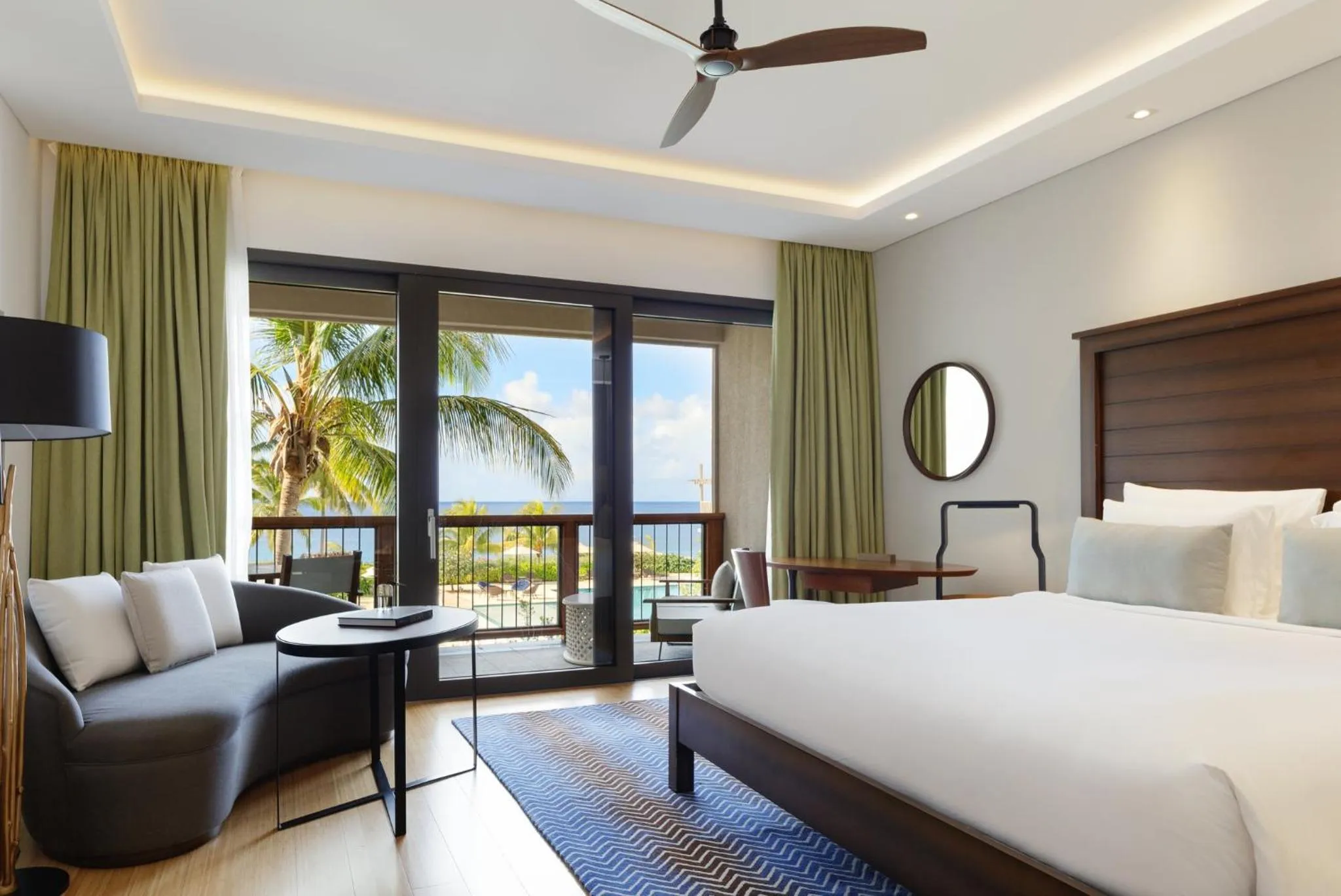 Photo of the whole room, Bed in InterContinental Dominica Cabrits Resort & Spa by IHG