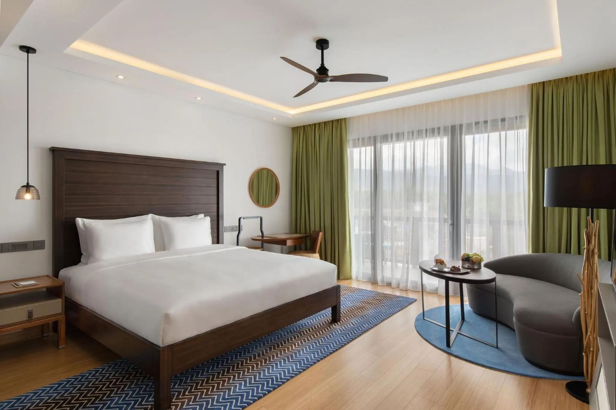 Photo of the whole room, Bed in InterContinental Dominica Cabrits Resort & Spa by IHG