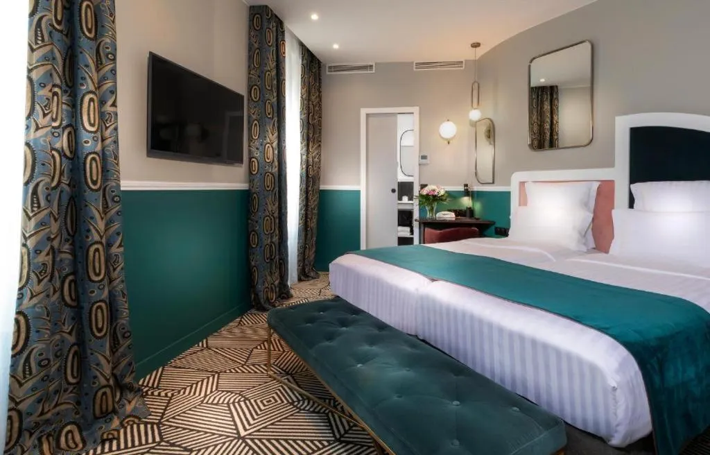 Bed in Hotel Elysa-Luxembourg