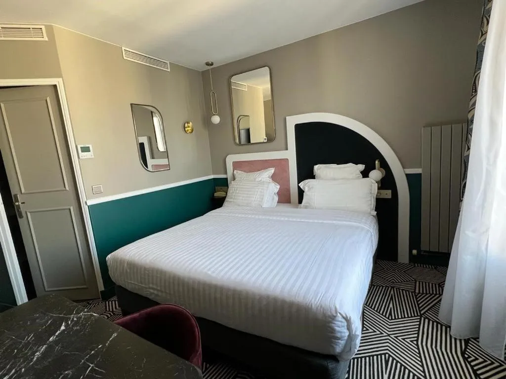 Bed in Hotel Elysa-Luxembourg