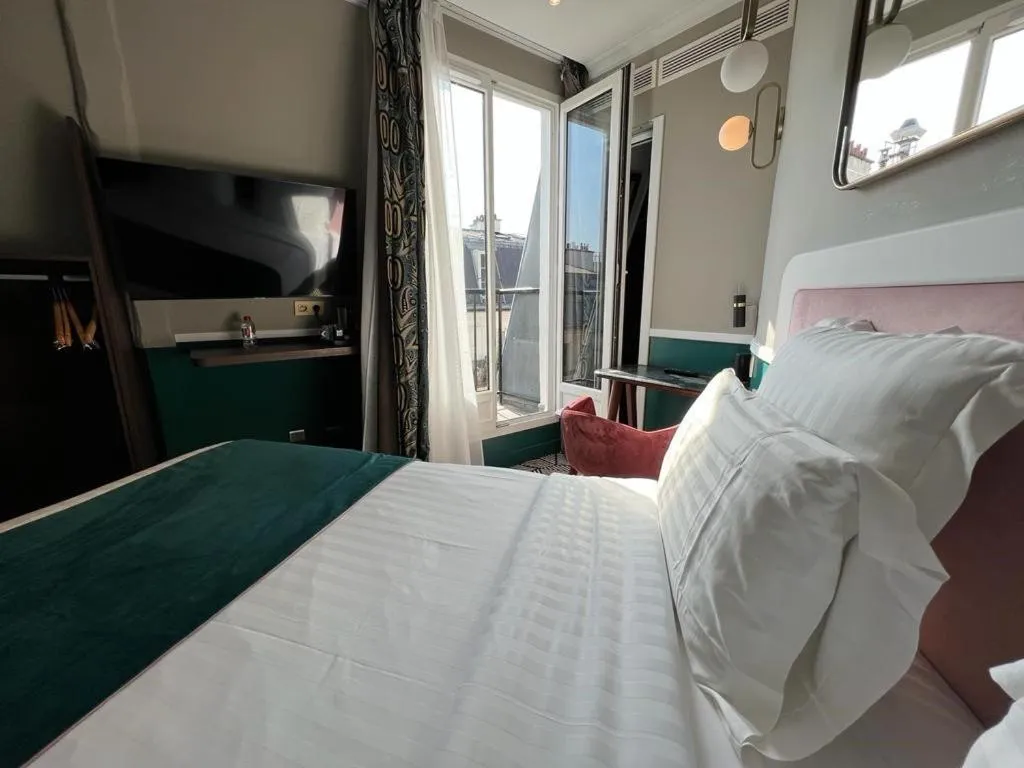 Bed in Hotel Elysa-Luxembourg