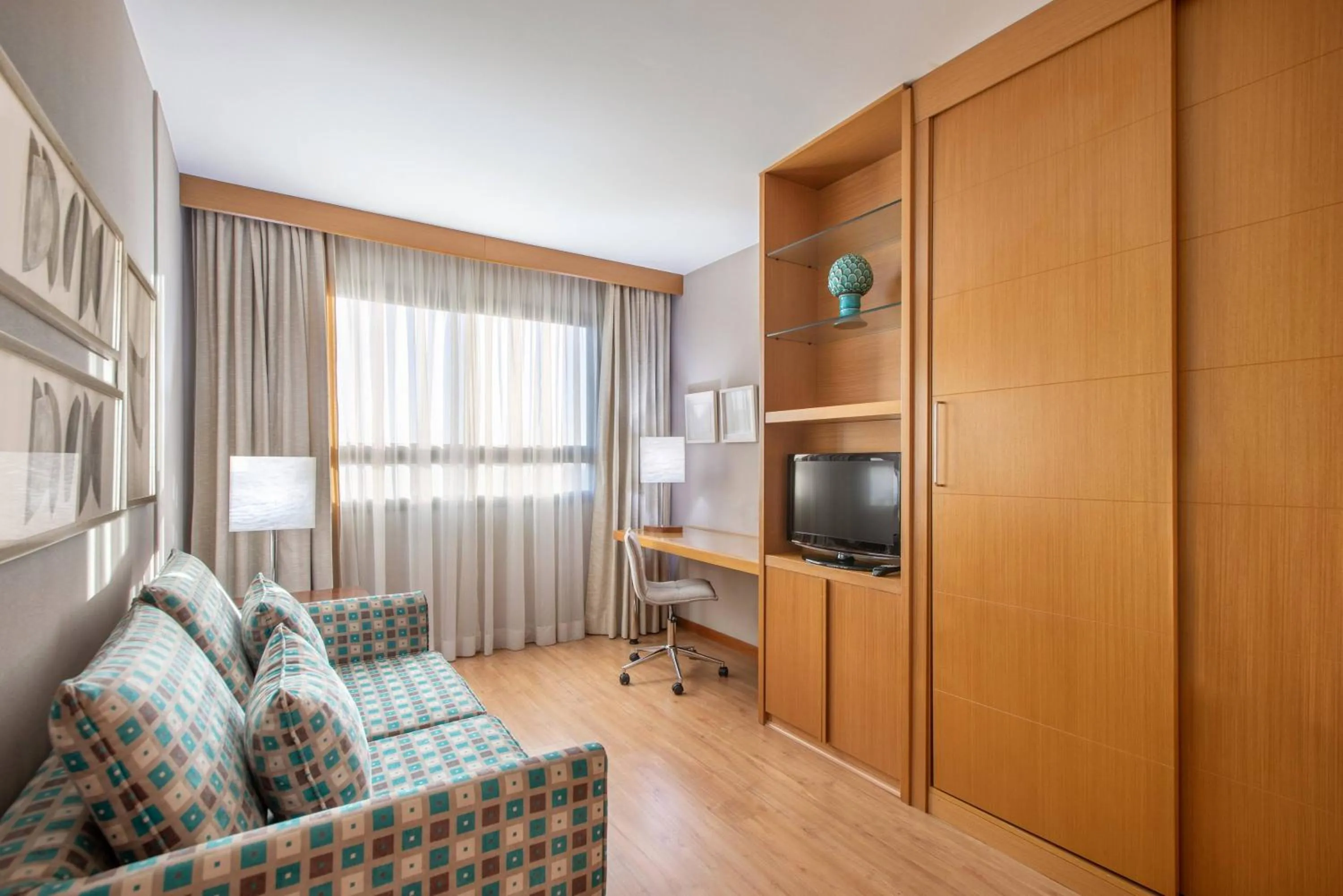 Bedroom in Hotel Brasil 21 Suites Affiliated by Meliá