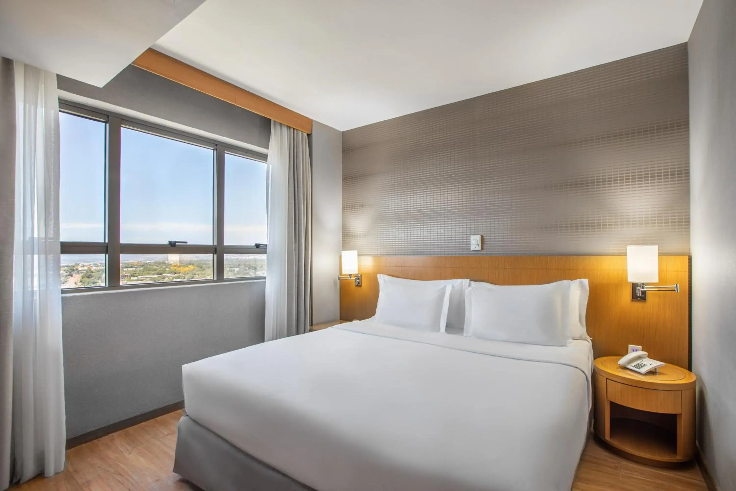 View (from property/room), Bed in Brasil 21 Suites Affiliated by Meliá View (from property/room), Bed in Brasil 21 Suites Affiliated by Meliá