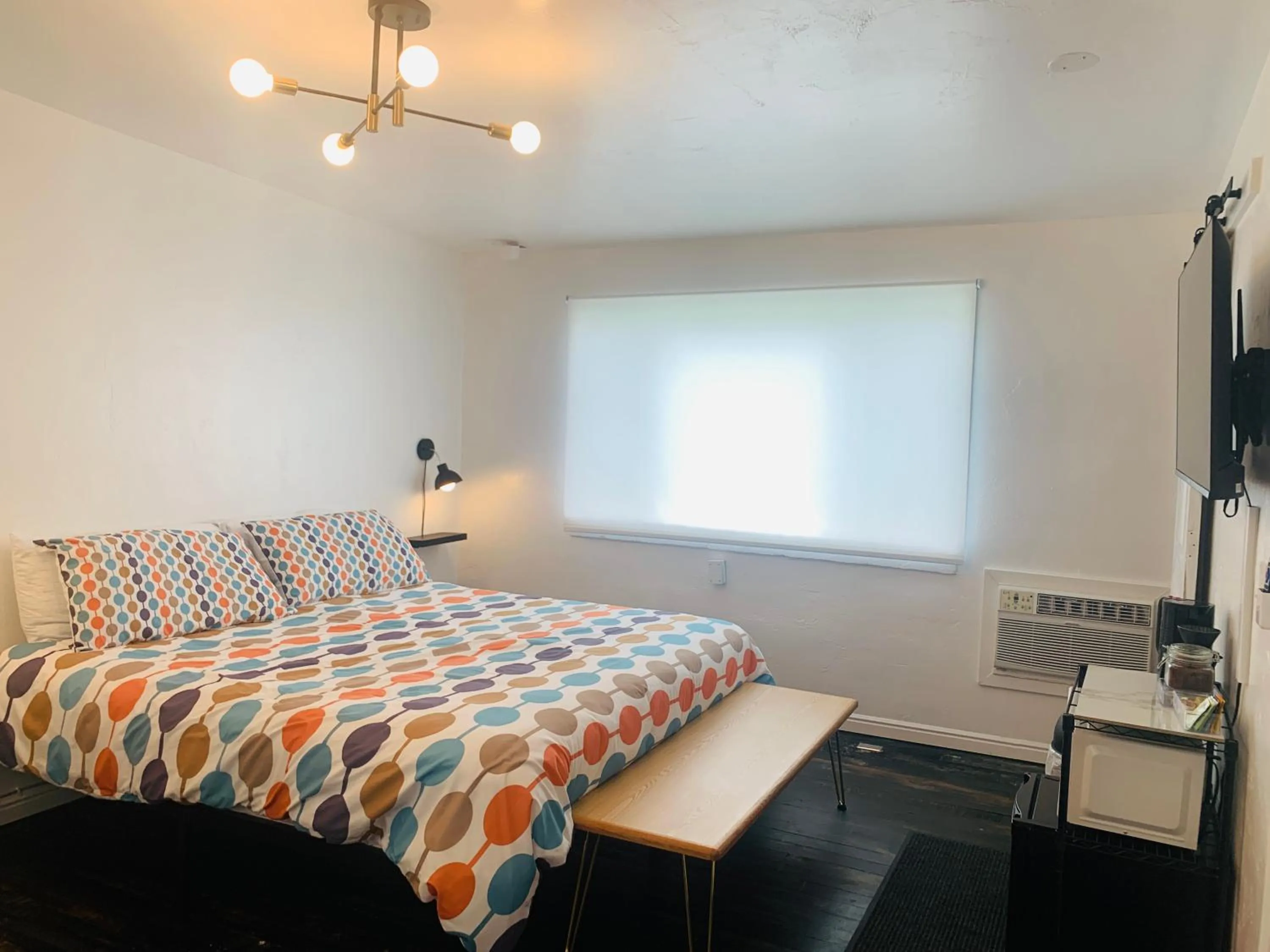 Bed in Dragonfly Motor Lodge