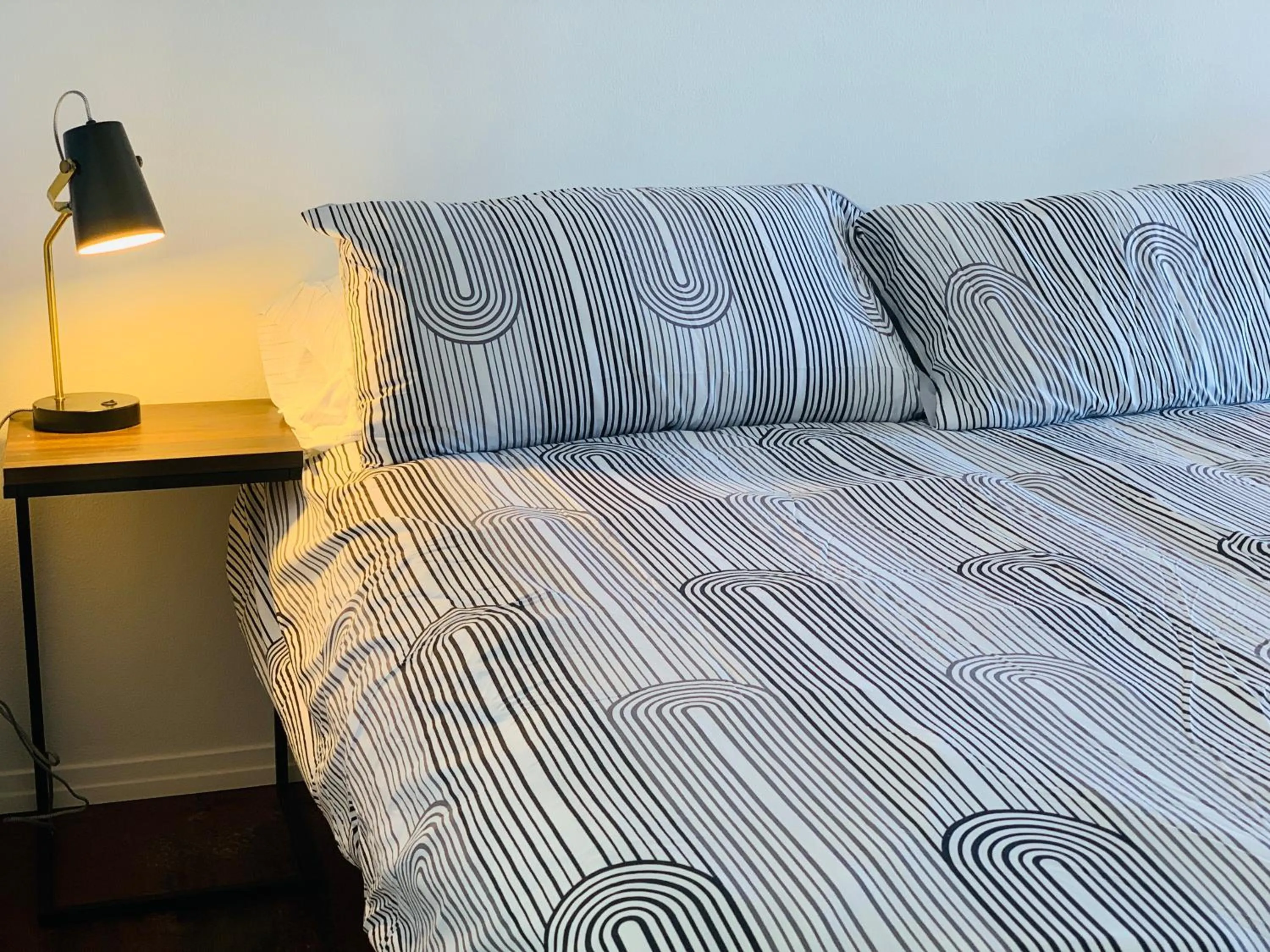 Bed in Dragonfly Motor Lodge