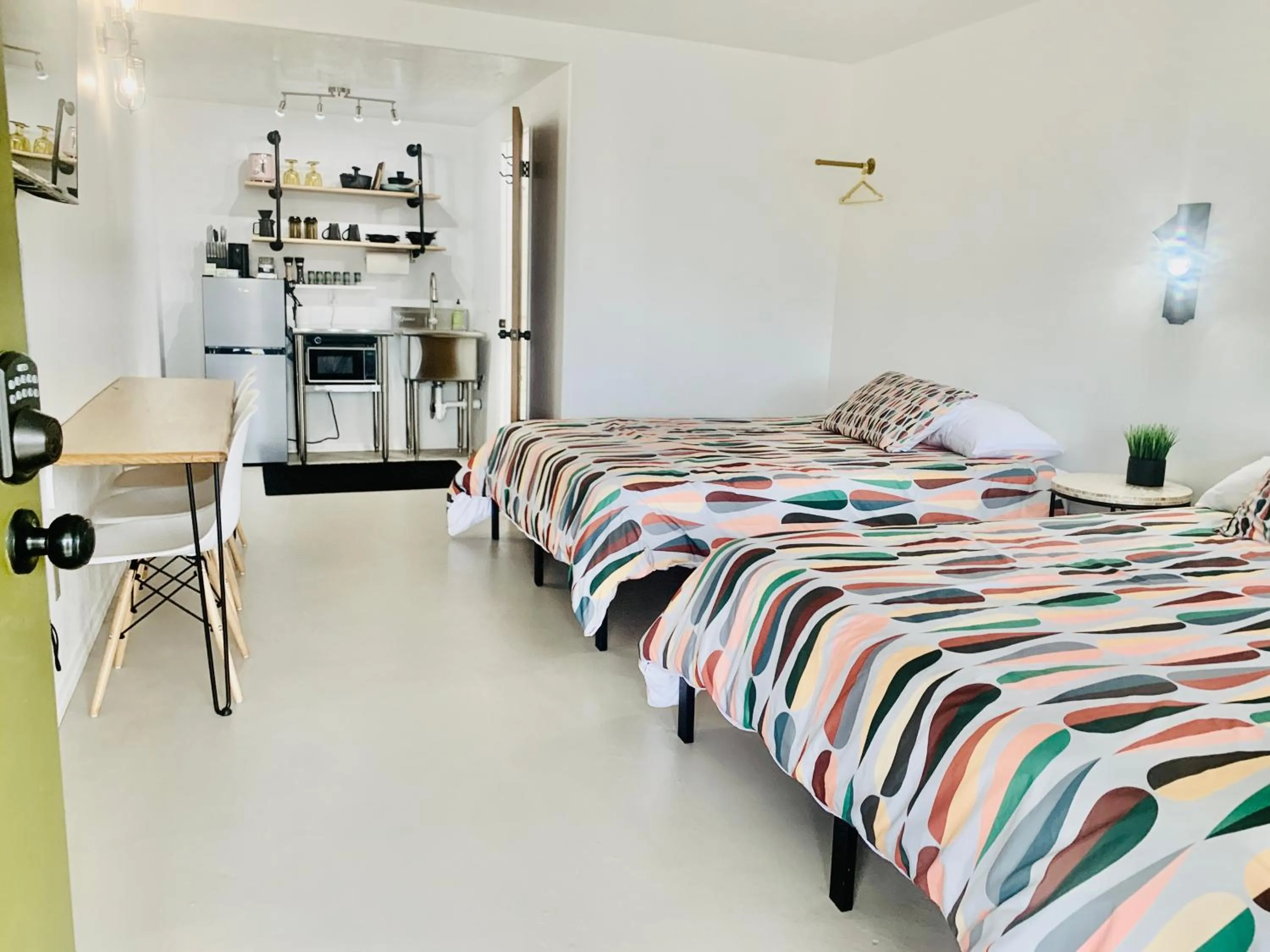 Bed in Dragonfly Motor Lodge