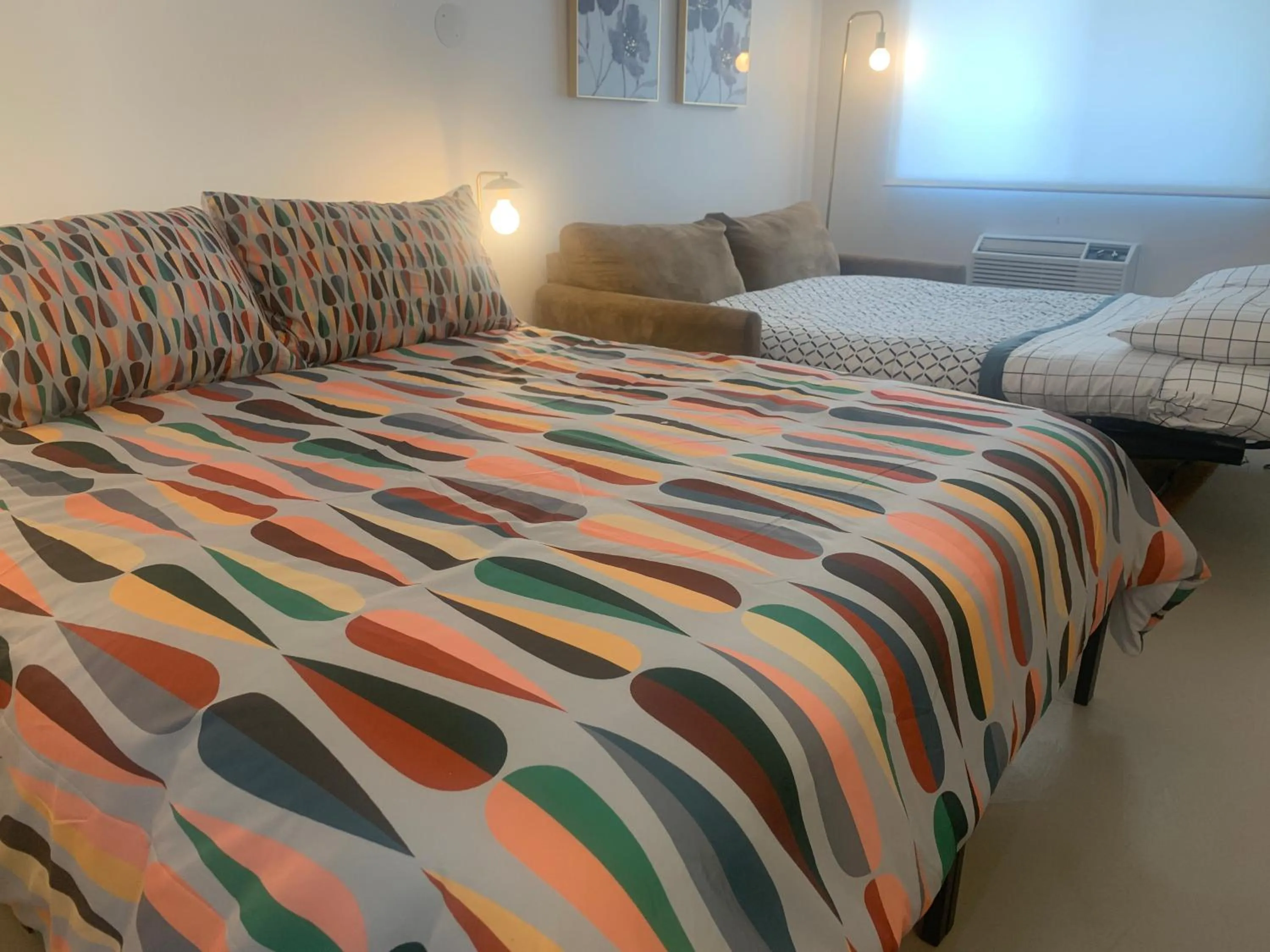 Bed in Dragonfly Motor Lodge