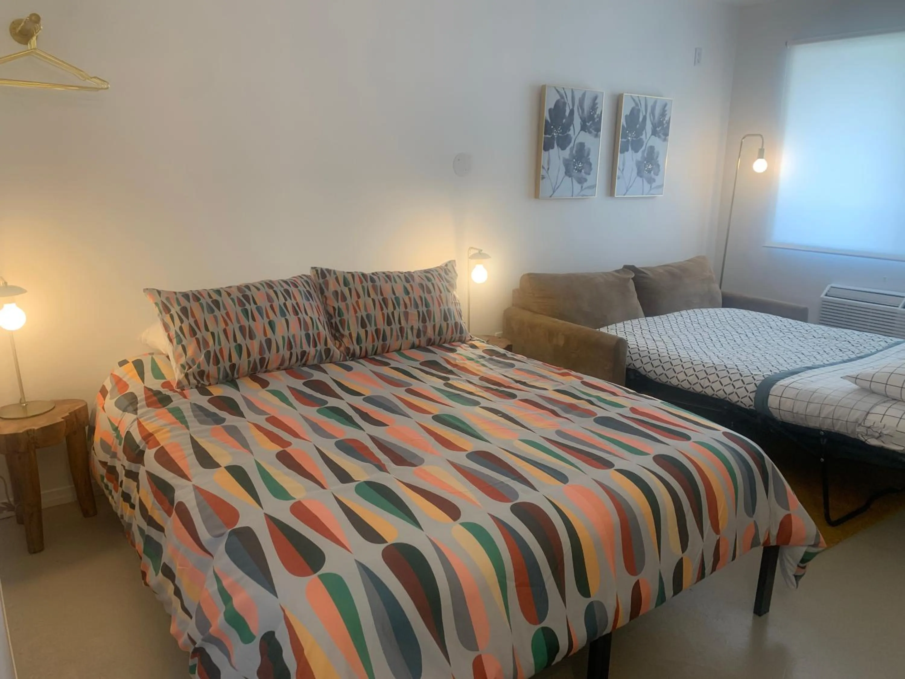 Bed in Dragonfly Motor Lodge