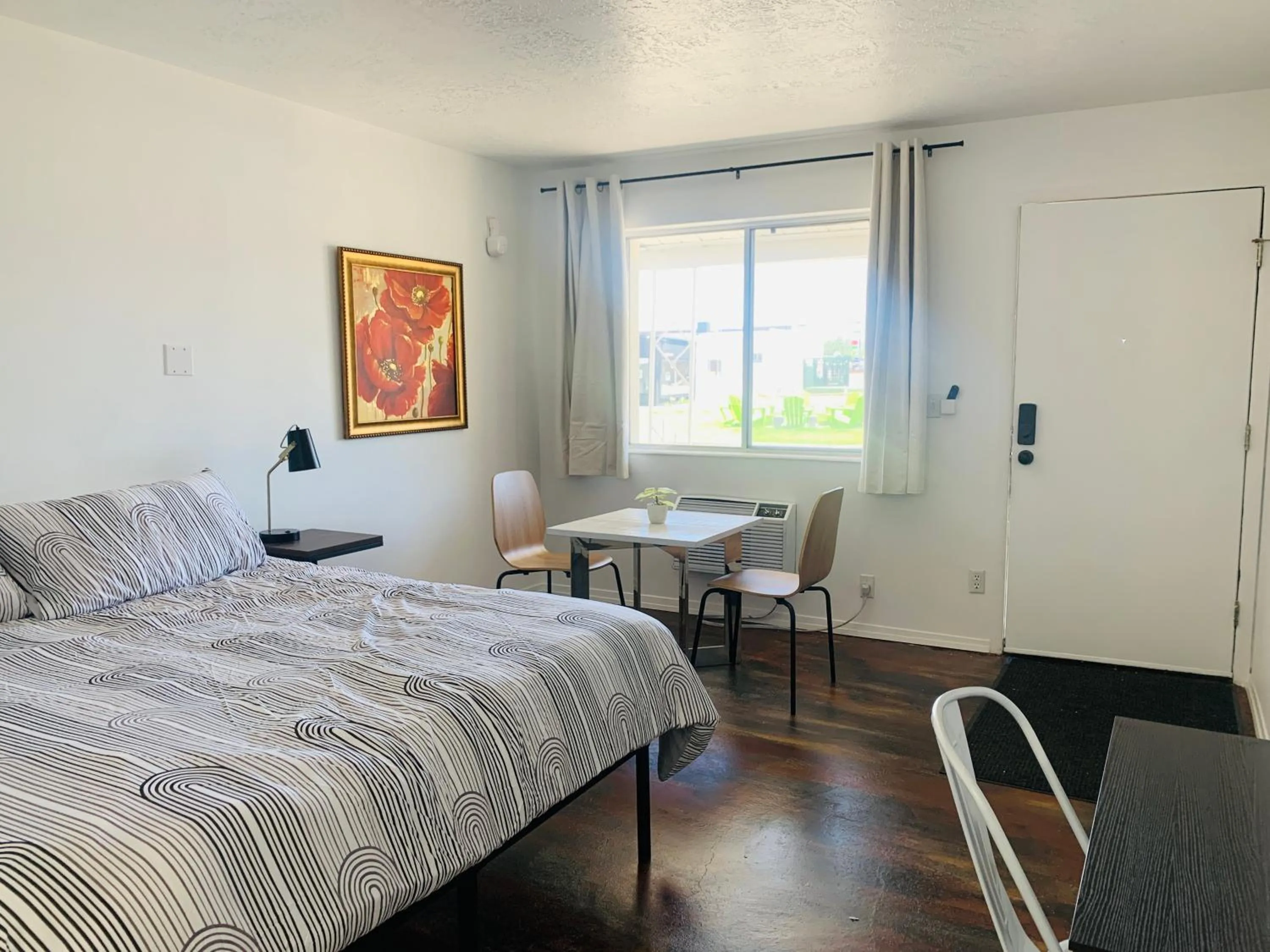 Bed in Dragonfly Motor Lodge