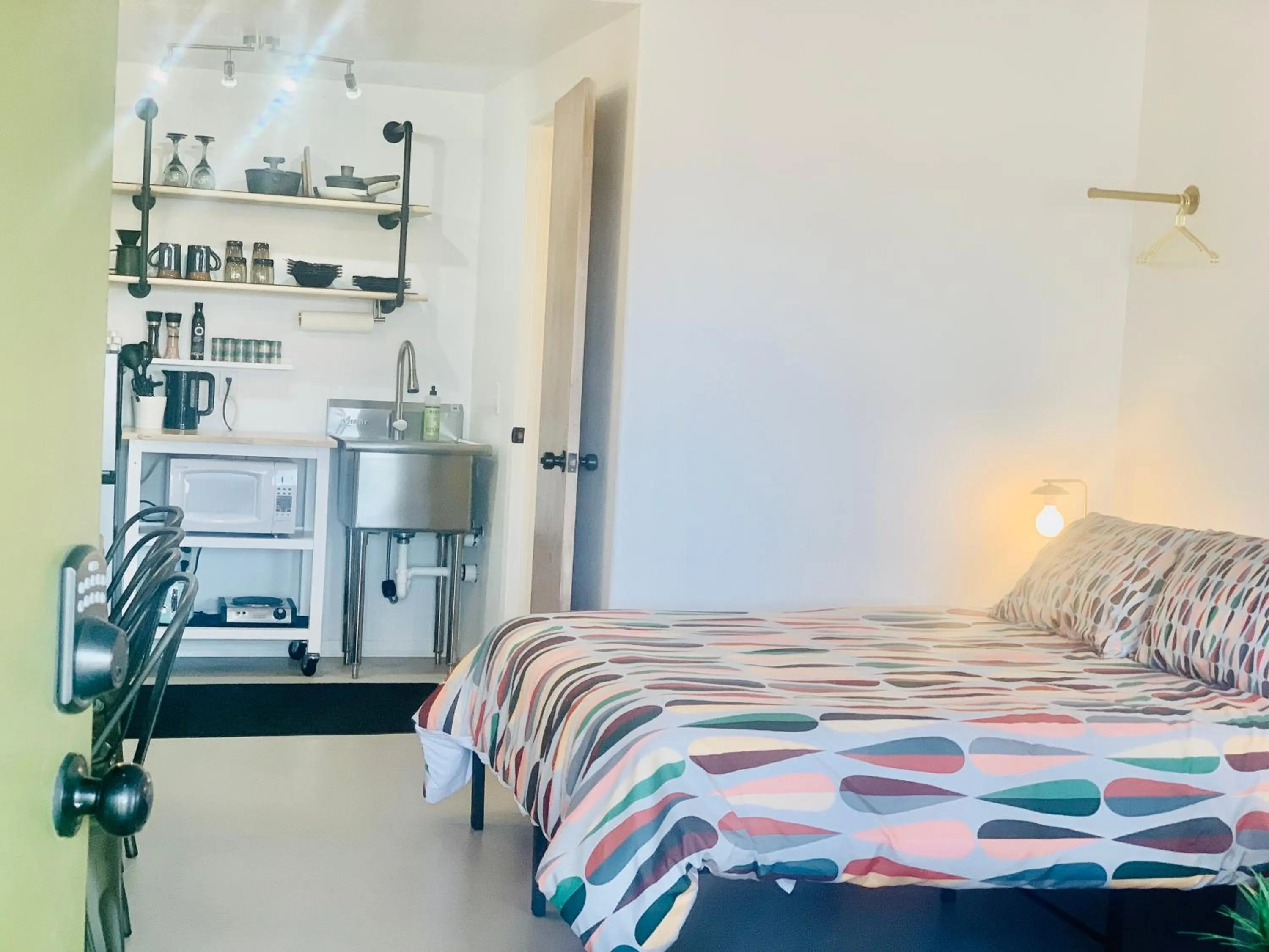 Bed in Dragonfly Motor Lodge