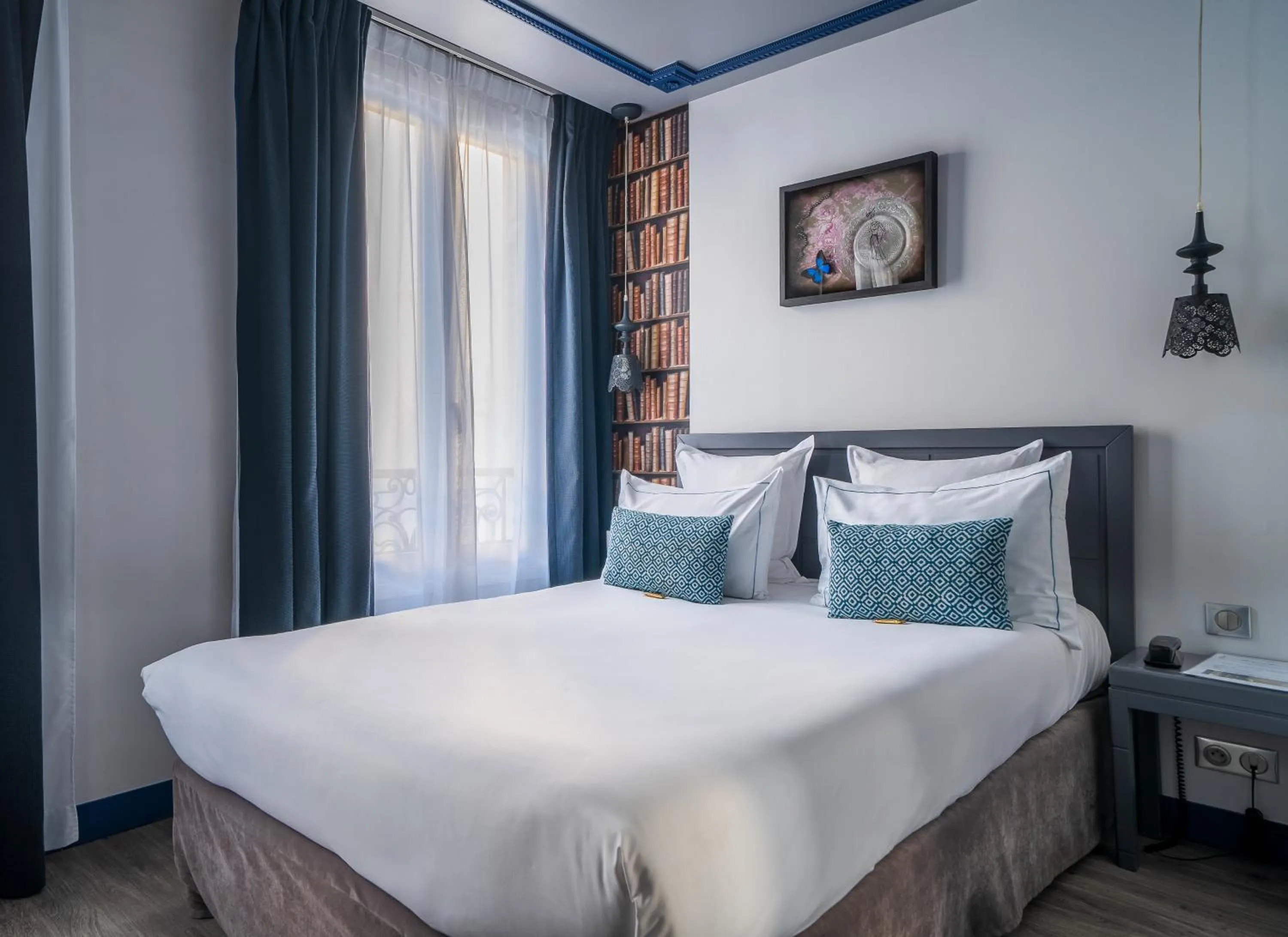 Bed in Hotel Mademoiselle