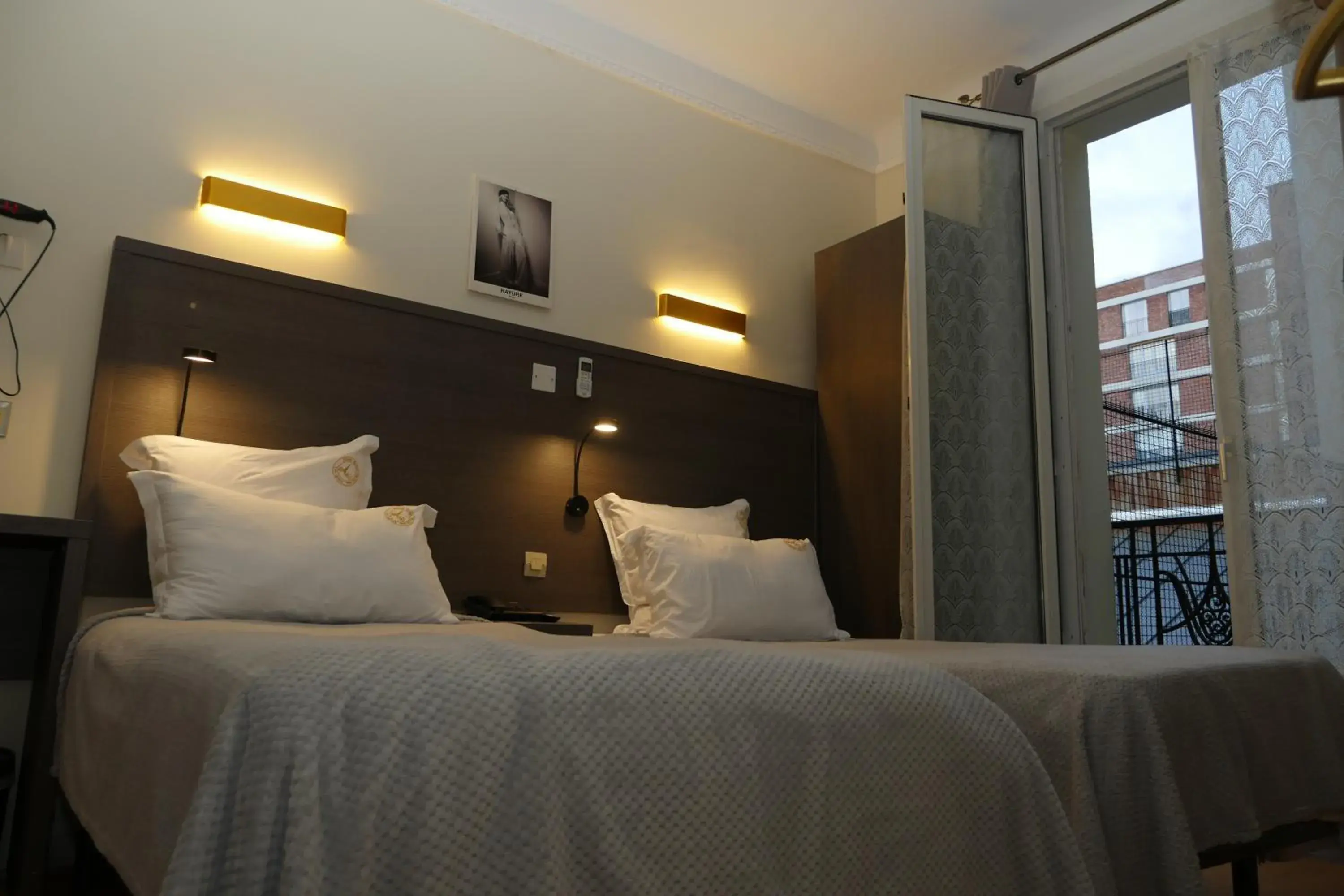 Staff, Bed in Hotel Novex Paris Staff, Bed in Hotel Novex Paris