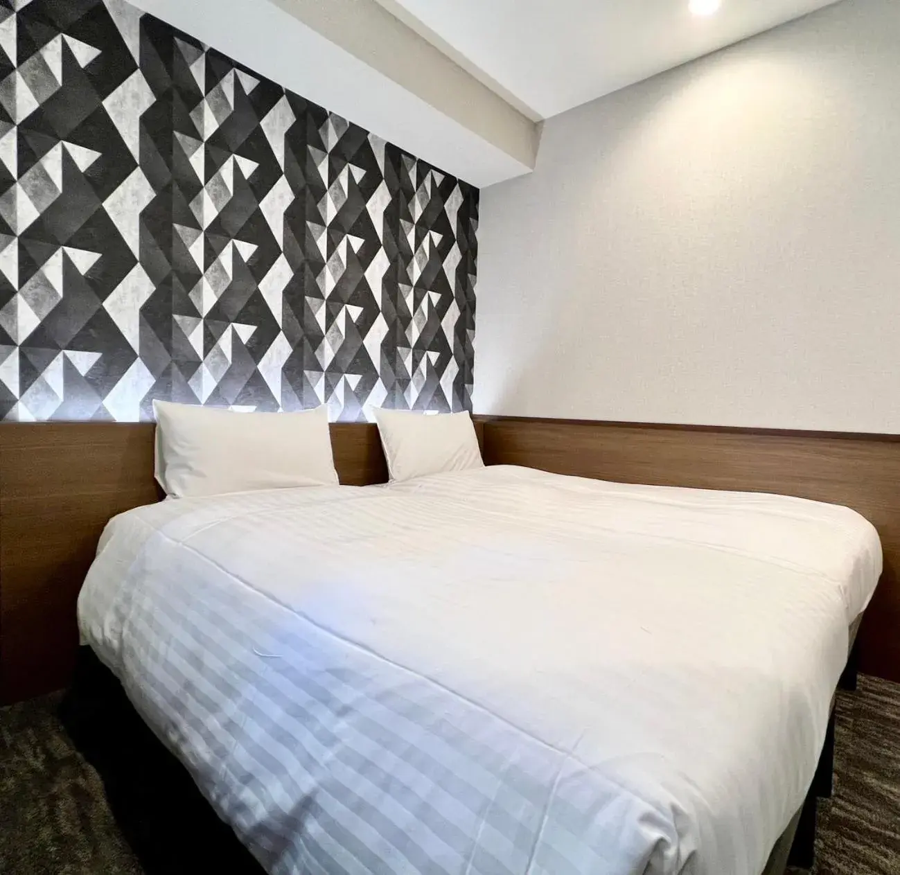 Bed in KIN HOTEL Bed in KIN HOTEL