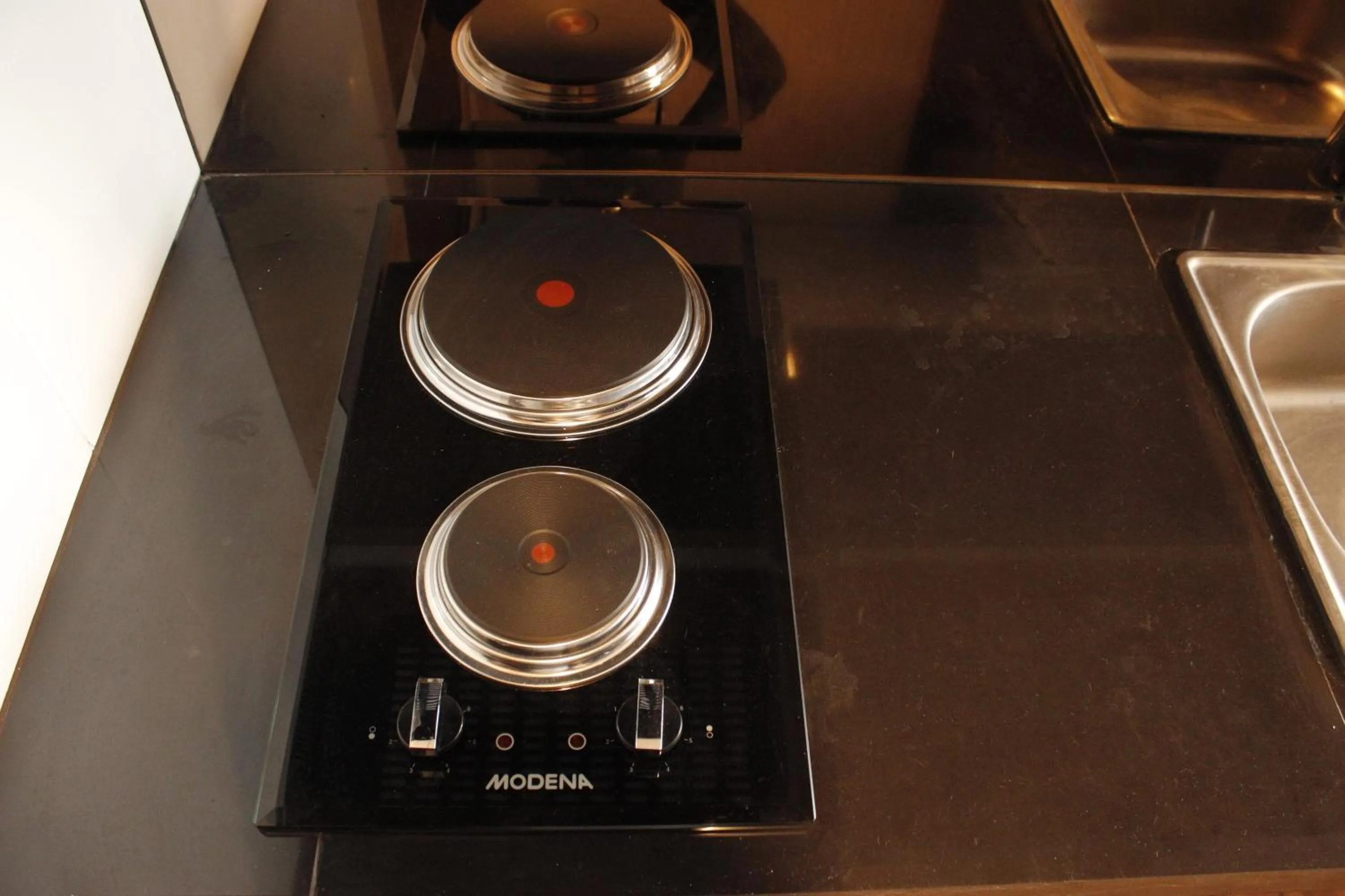 Kitchen or kitchenette in Classic 2BR Apartment At Gateway Pasteur near Exit Toll By Travelio