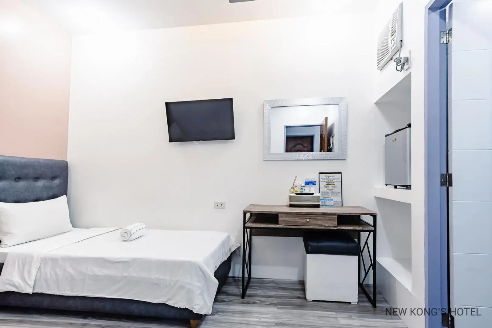 View (from property/room), Bed in New Kong's Hotel View (from property/room), Bed in New Kong's Hotel