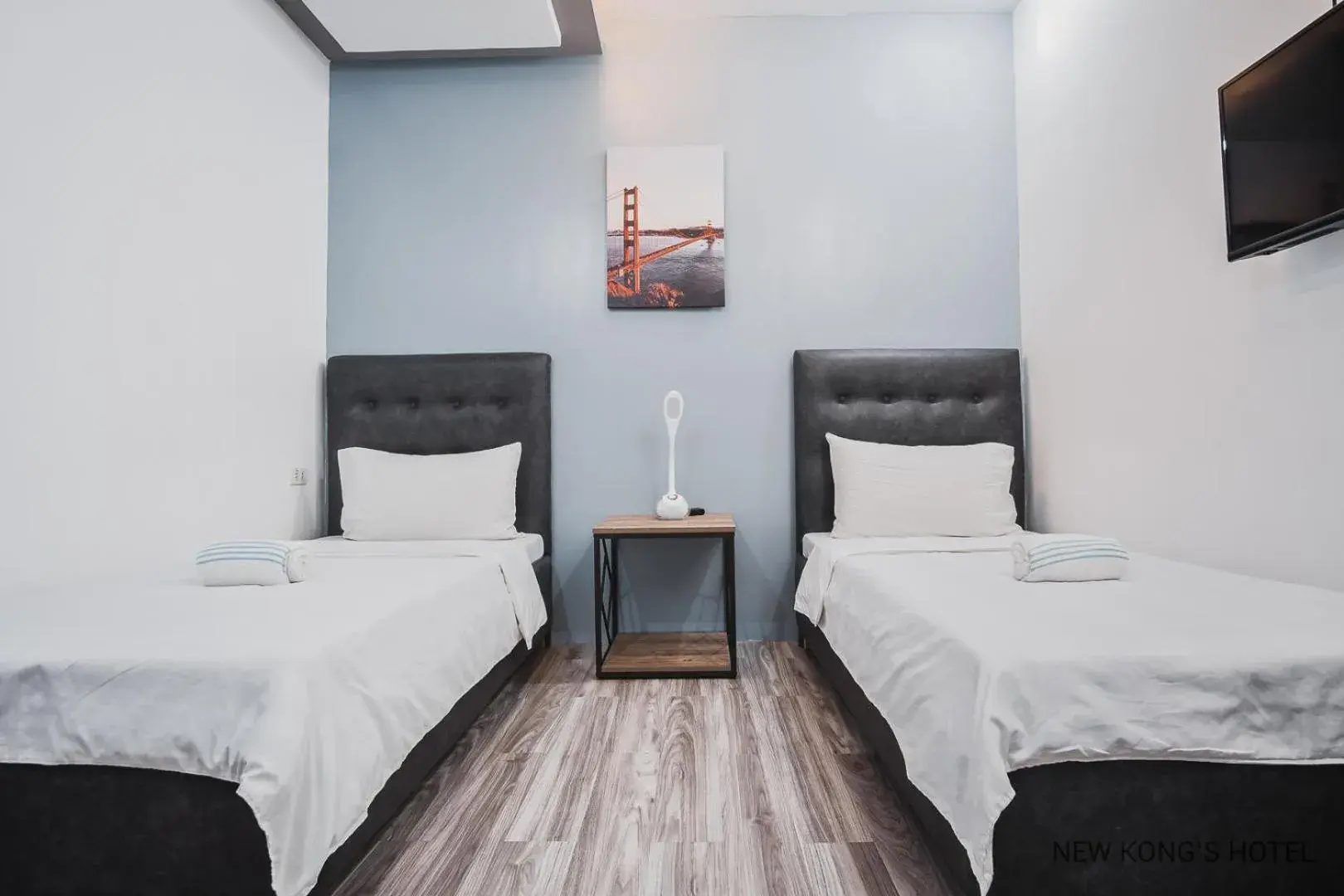 Bed in New Kong's Hotel Bed in New Kong's Hotel