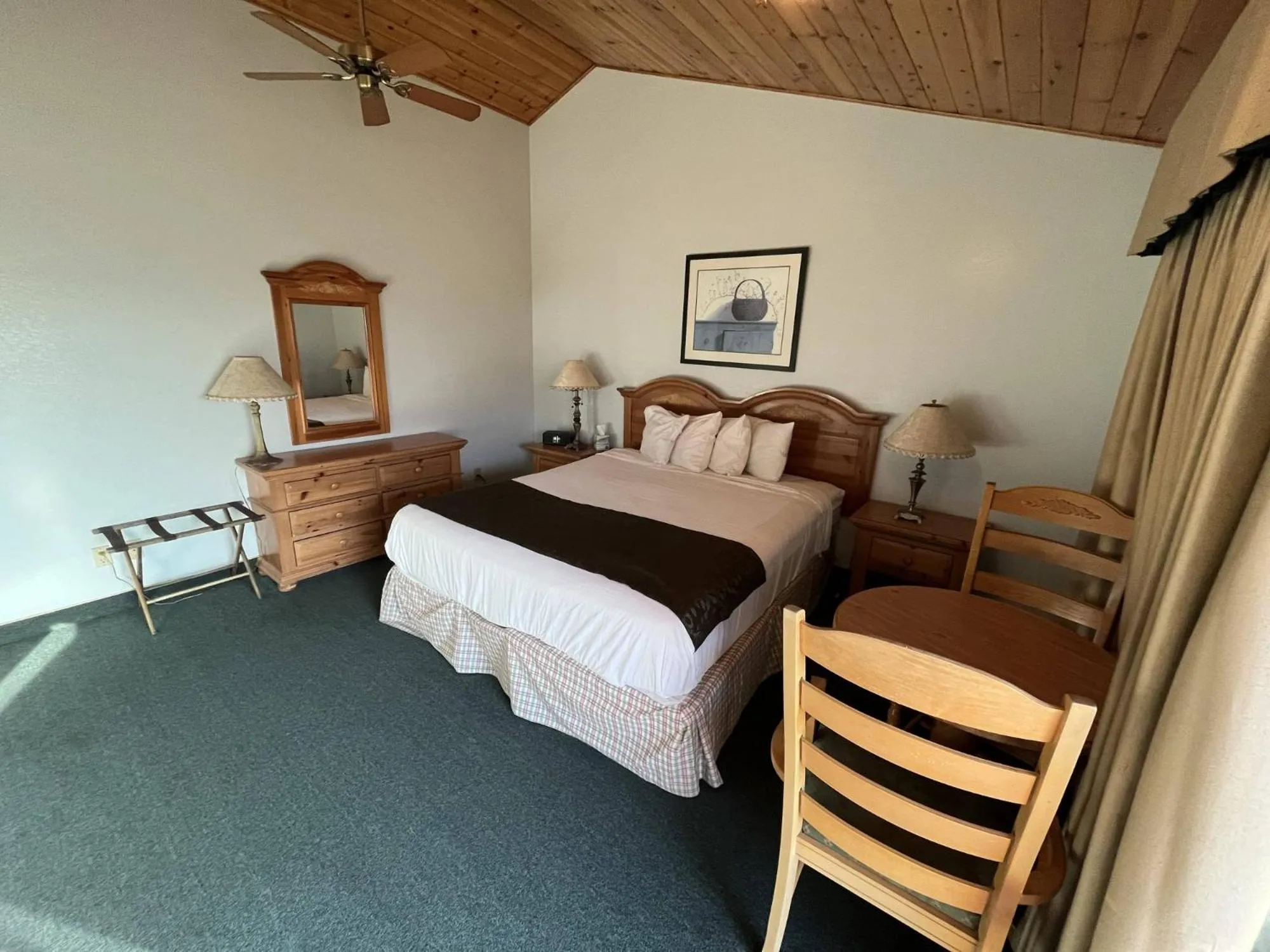 Bed in Whispering Pines Lodge