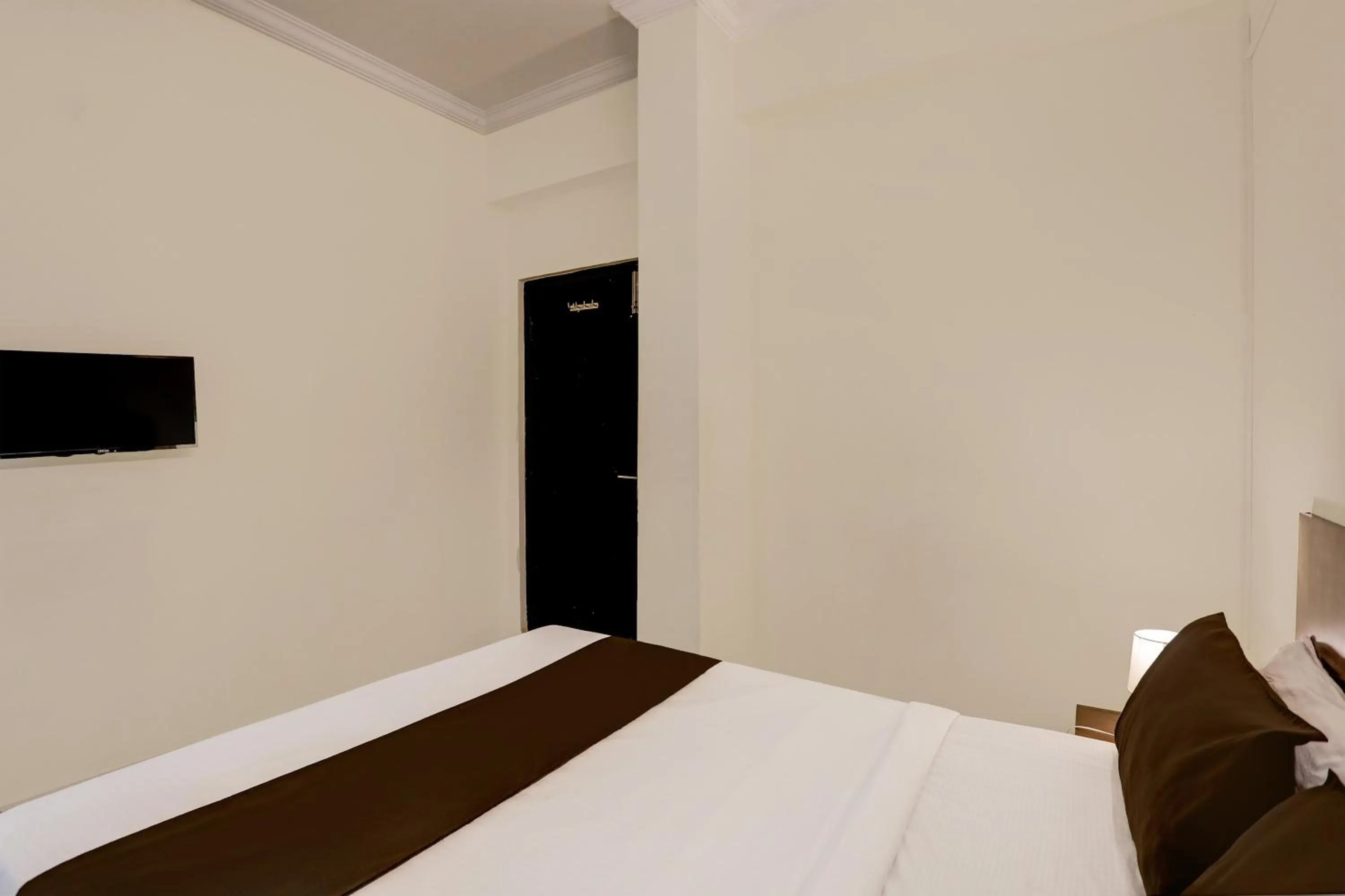 Bedroom, Bed in Hotel O Shiridi Residency
