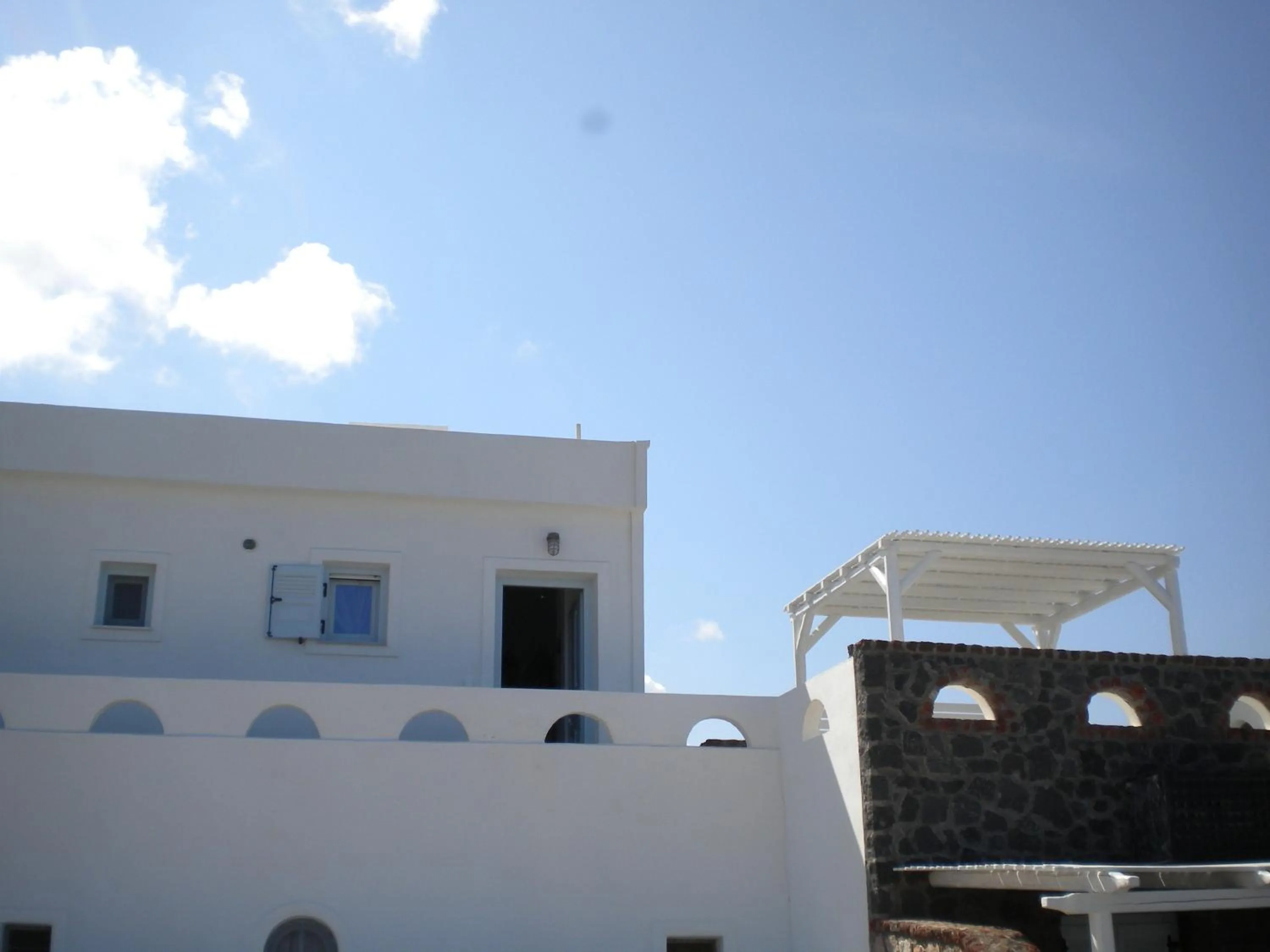 Property building in Starlight Luxury Seaside Villa & Suites