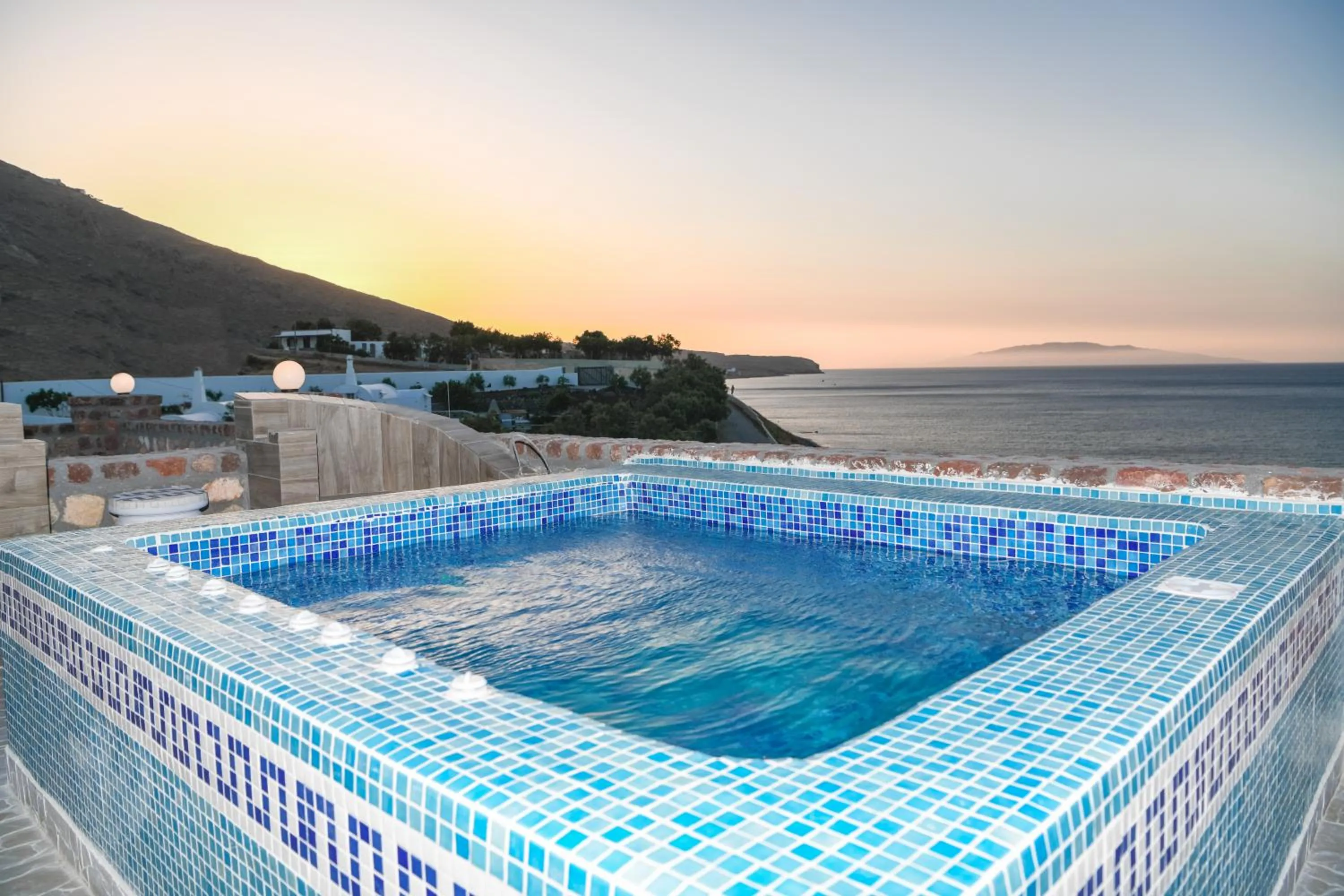 Swimming pool in Starlight Luxury Seaside Villa & Suites