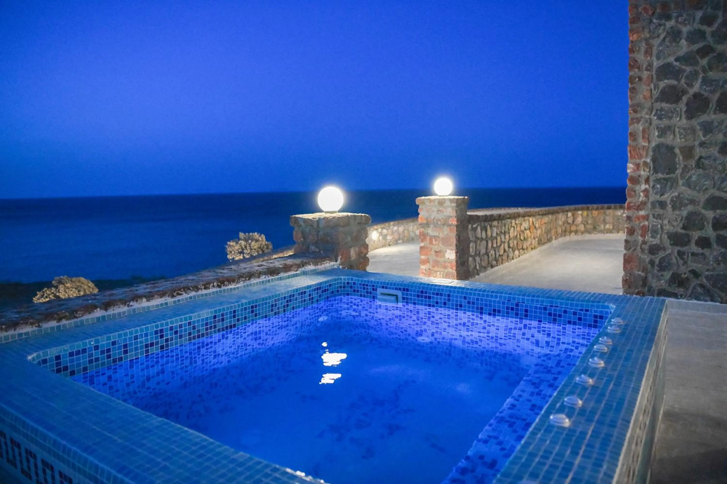 Pool view in Starlight Luxury Seaside Villa & Suites