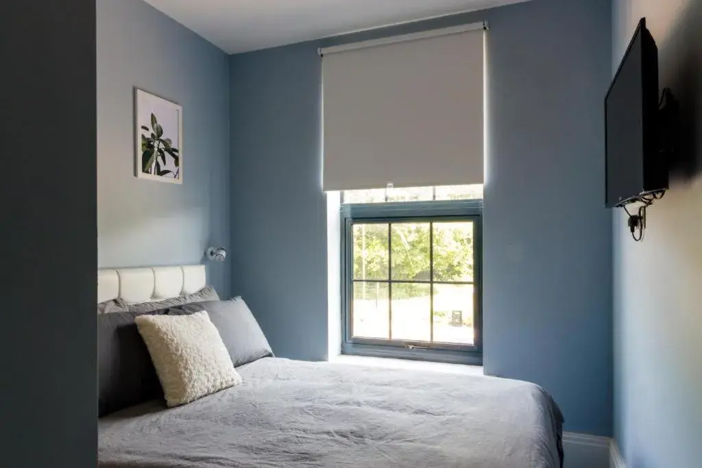 Bedroom, Bed in OYO Ruby Pub & Hotel Bedroom, Bed in OYO Ruby Pub & Hotel